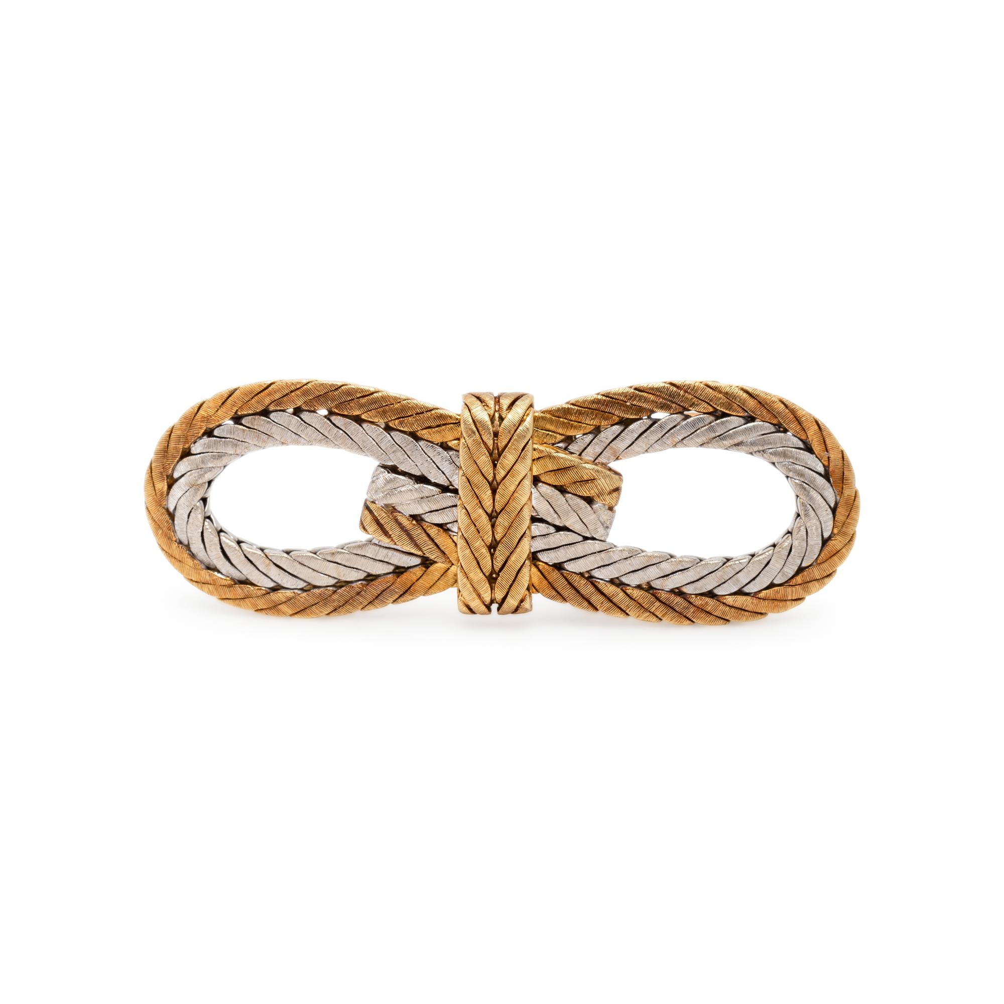BUCCELLATI, BICOLOR GOLD KNOT BROOCH