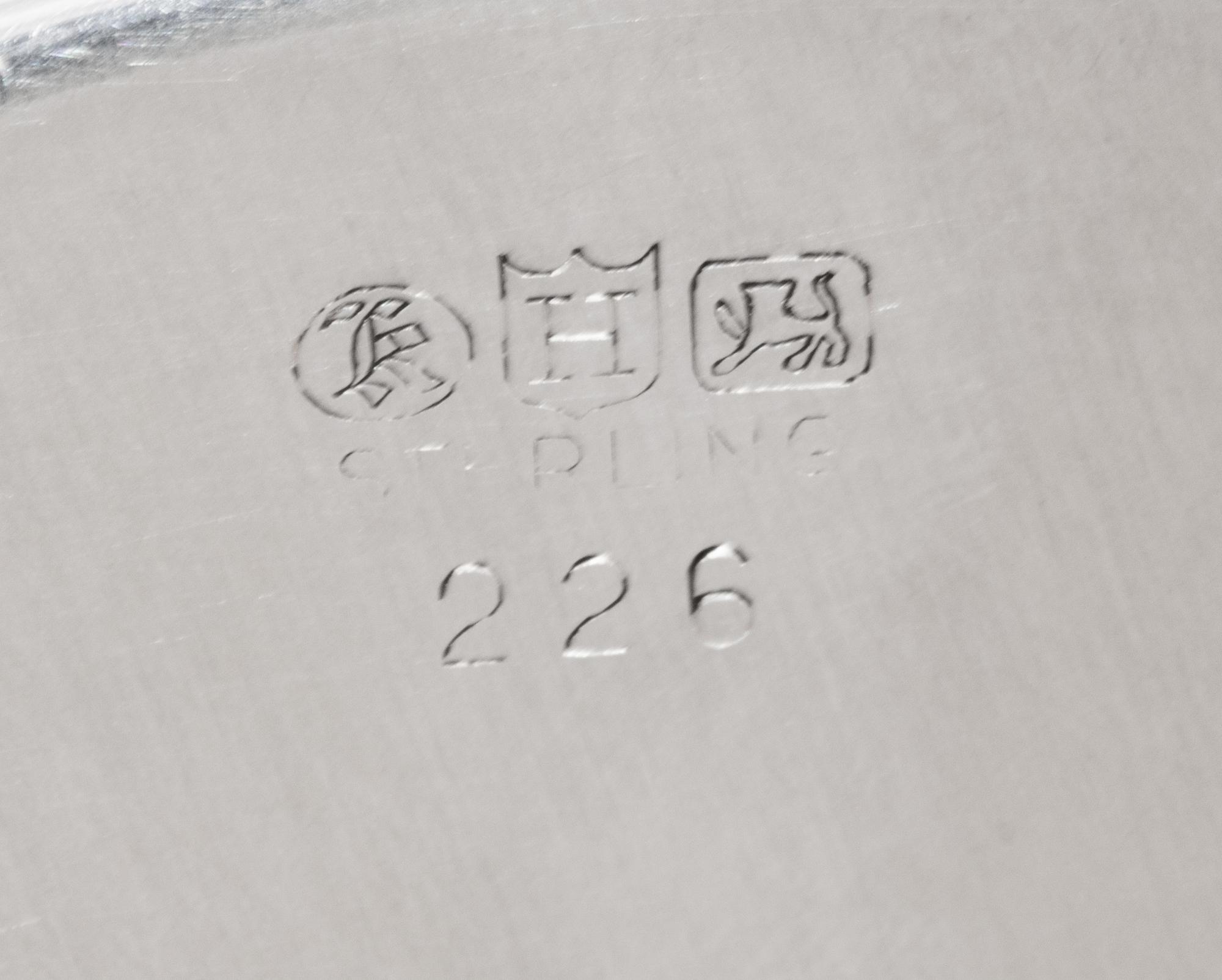 A Set of Twelve American Silver Bread Plates