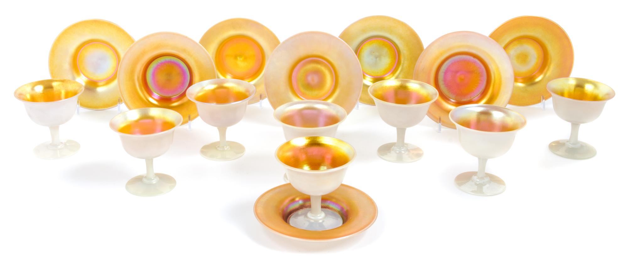 Steuben, EARLY 20TH CENTURY, a set of eight Aurene sherberts and under plates, in gold iridescence