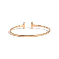 TIFFANY & CO., YELLOW GOLD BANGLE BRACELET