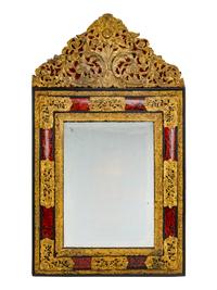 A Flemish Baroque Style Repouséed Brass, Simulated Tortoise and Ebonized Wood Mirror