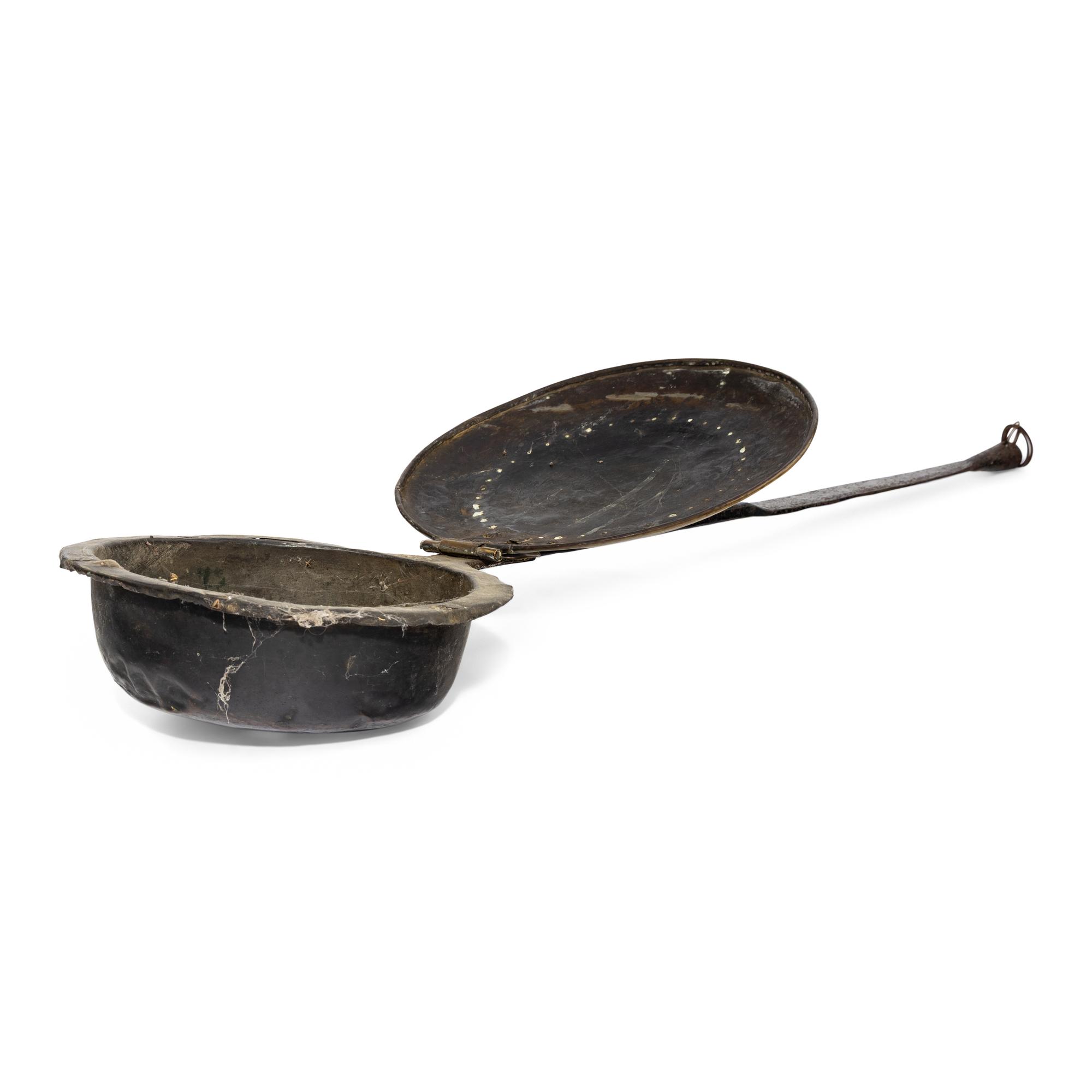 A Brass and Iron Bed Warmer