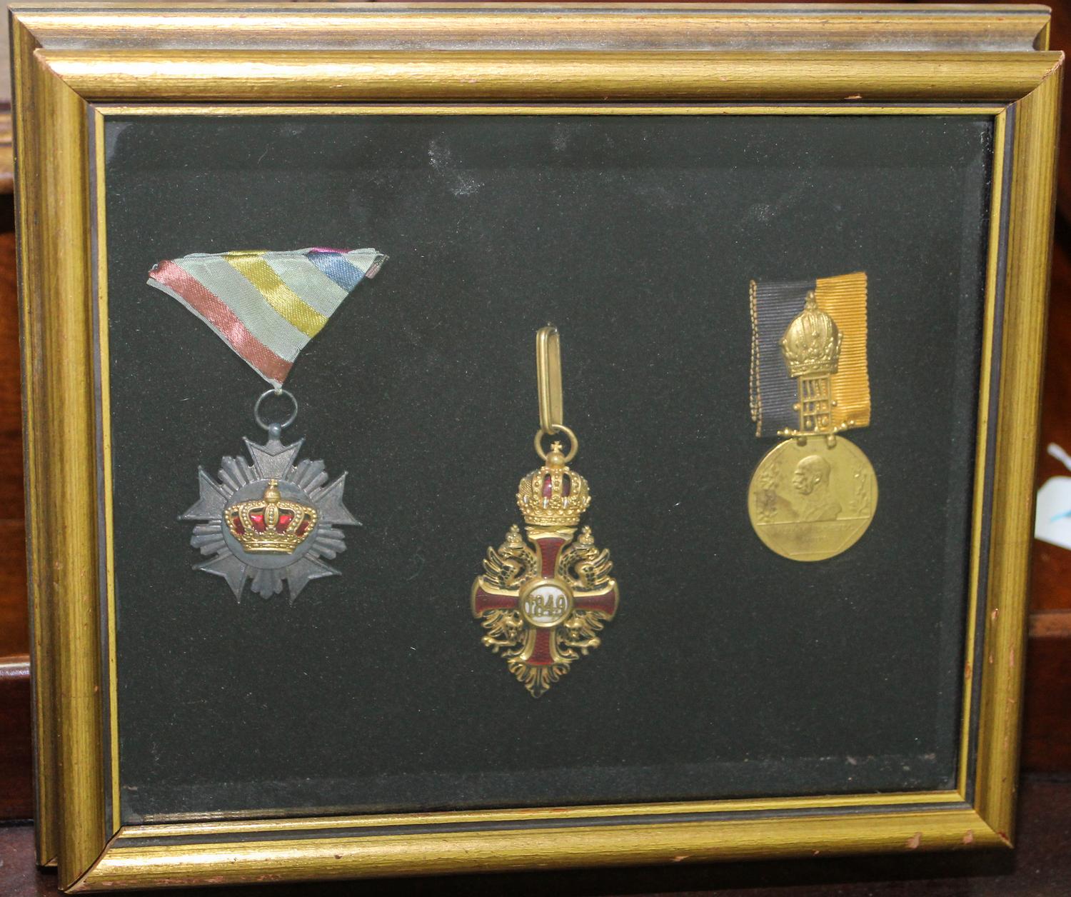 A Group of Three Medals Height of frame 8 1/2 x width 9 7/8 inches.