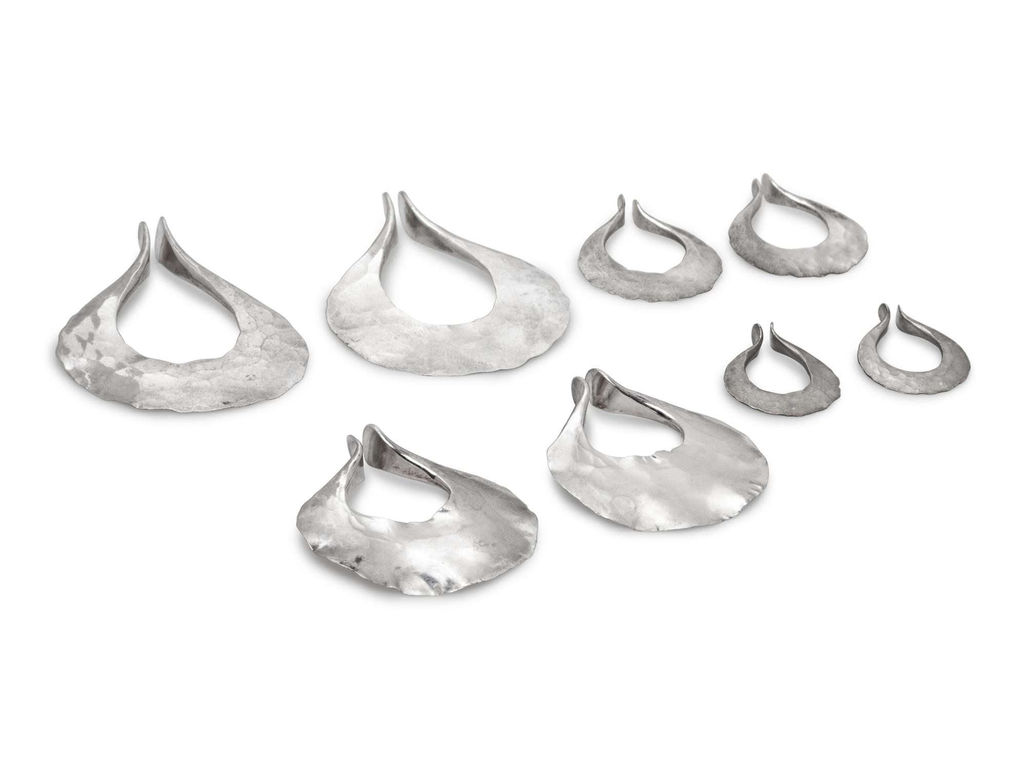 A Collection of Sterling Silver Hoop Earclips, Calf & Dragon,