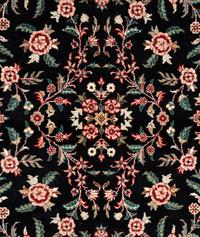 An Indo-Kashan Wool Rug