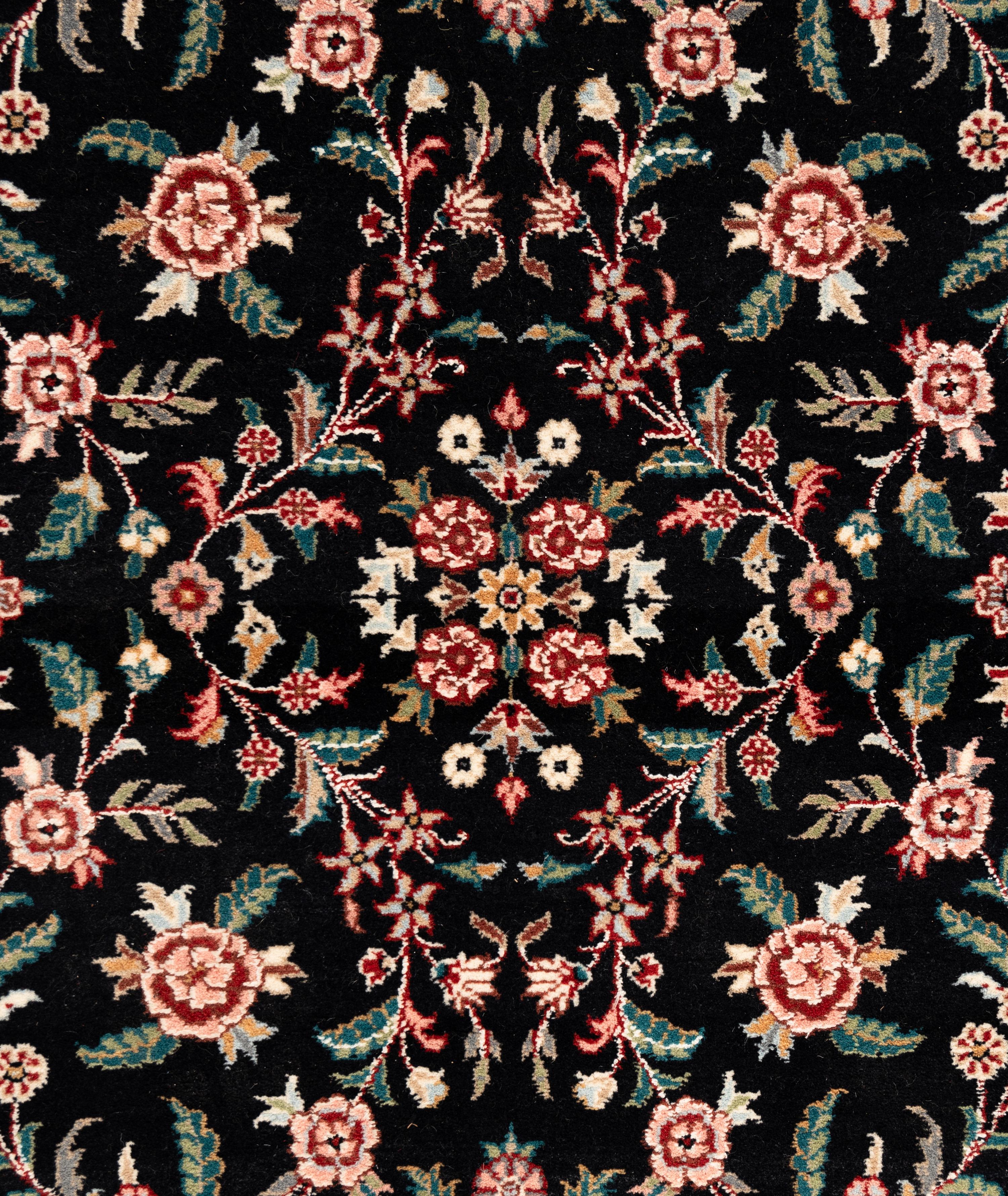 An Indo-Kashan Wool Rug