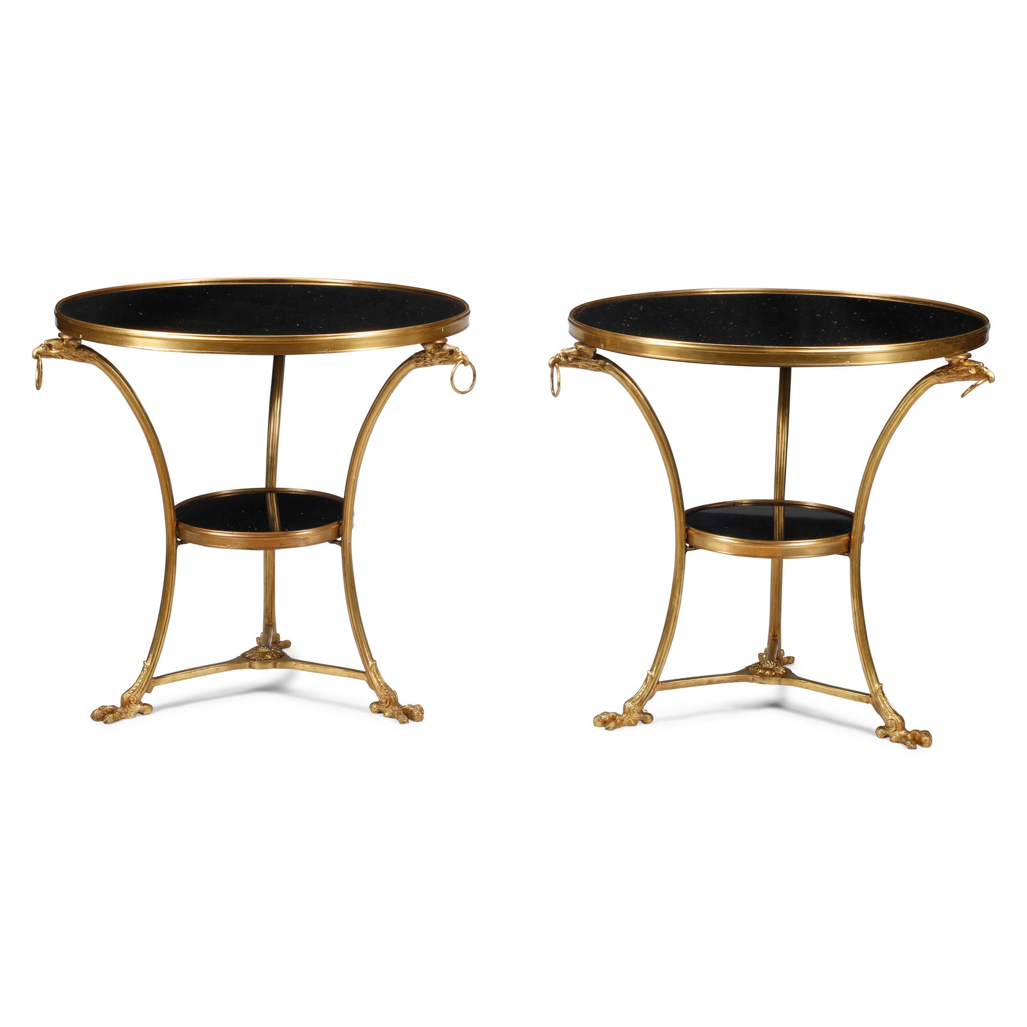 A Pair of Empire Style Gilt Bronze and Black Granite Guéridons