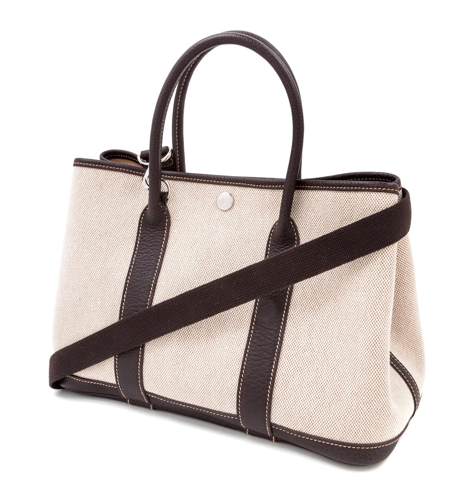 An Hermes Natural Canvas Garden Party PM Handbag, 12" x 8.5" x 5".