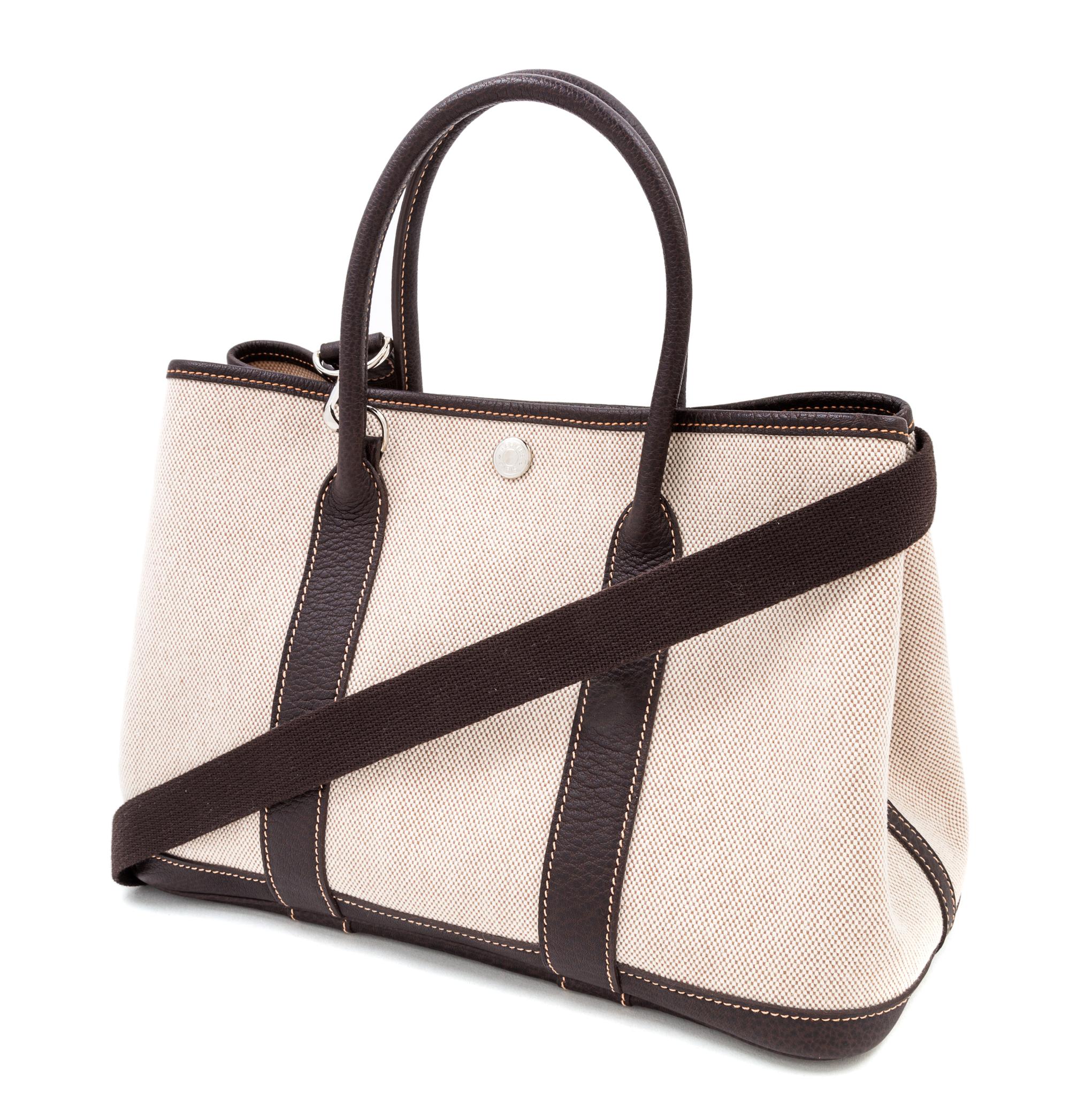 An Hermes Natural Canvas Garden Party PM Handbag, 12" x 8.5" x 5".