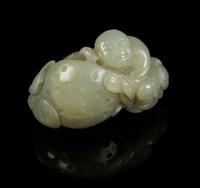 A Carved Jade Toggle Length 2 3/8 inches.