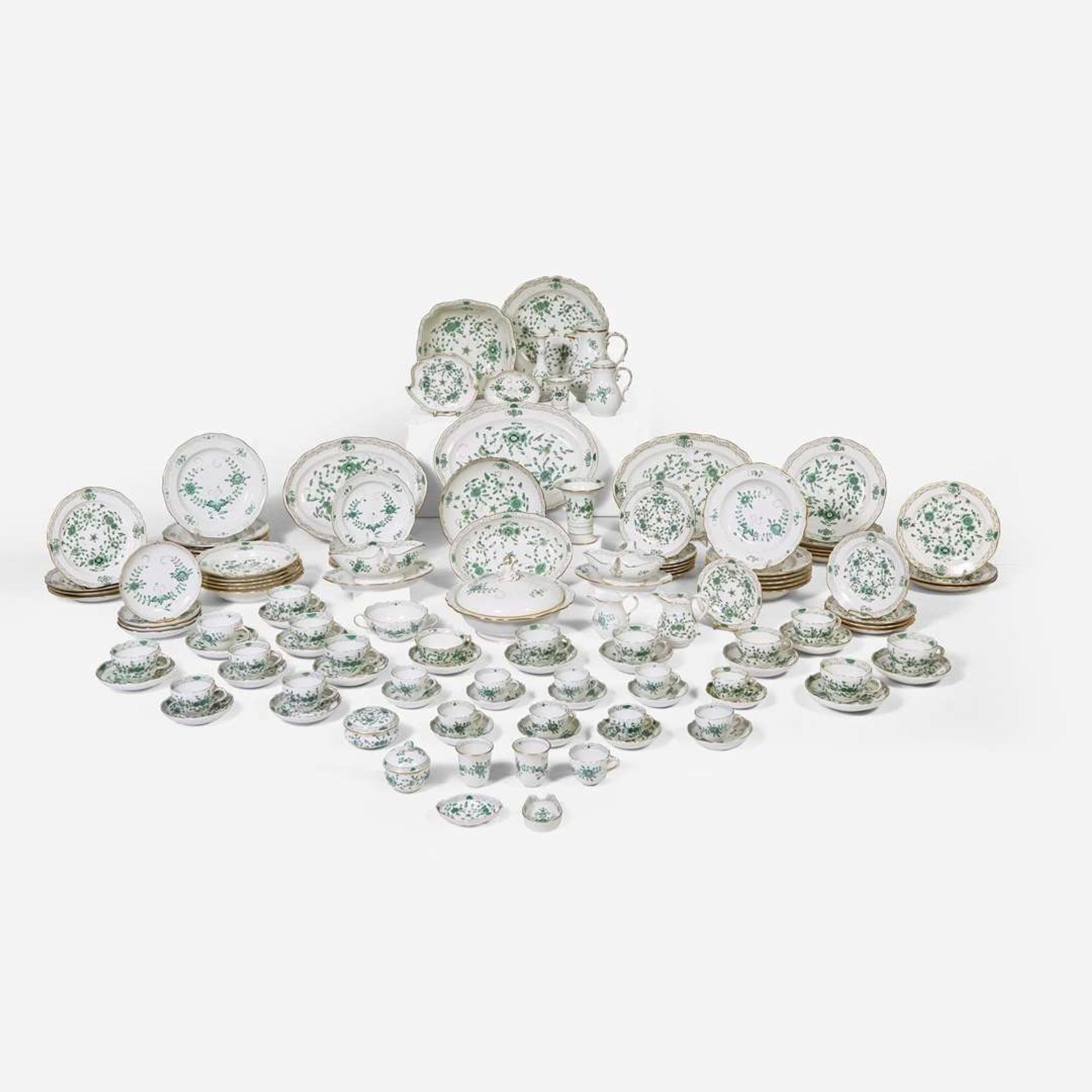 A large assembled collection of Meissen porcelain tablewares in the "Green Indian" pattern Germany, 19th / 20th century