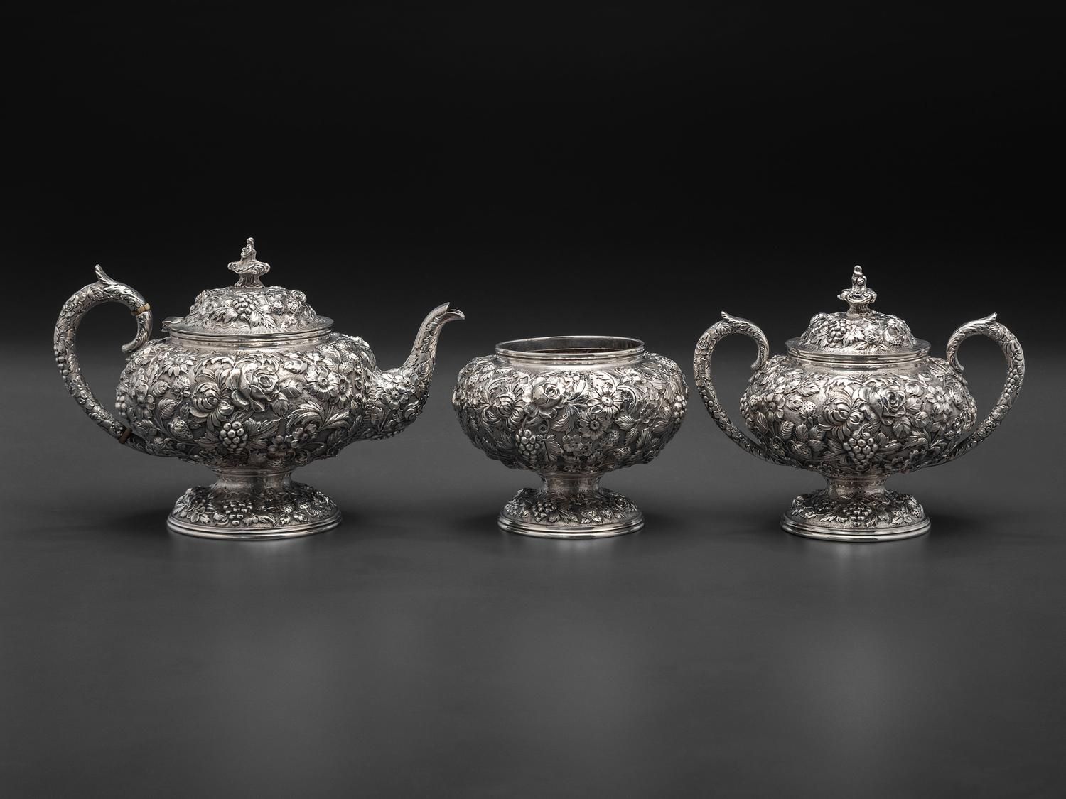 An American Repousse Silver Six-Piece Tea and Coffee Service