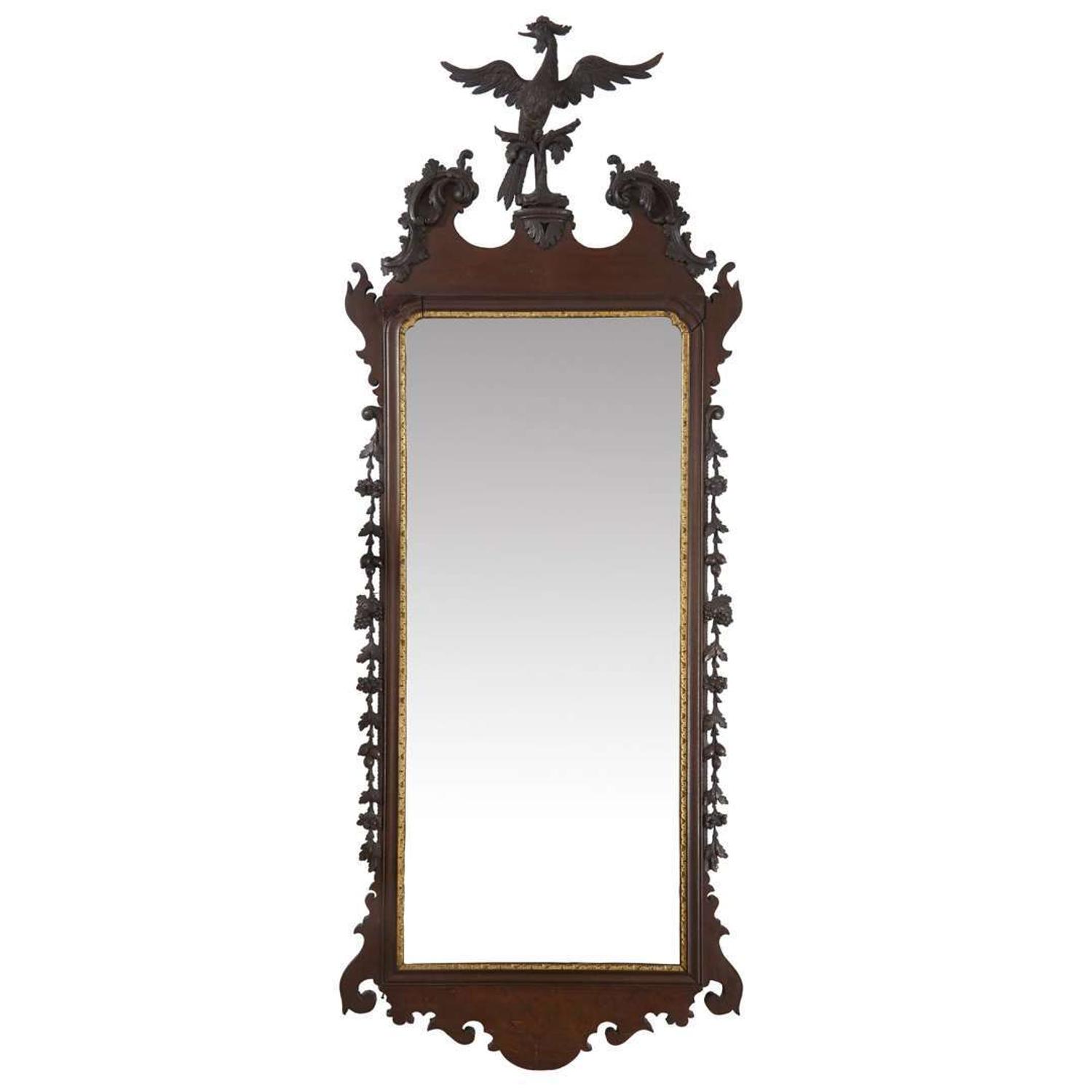 Chippendale carved mahogany looking glass with phoenix cartouche Philadelphia, PA, carving attributed to John Pollard (1740-1787) and