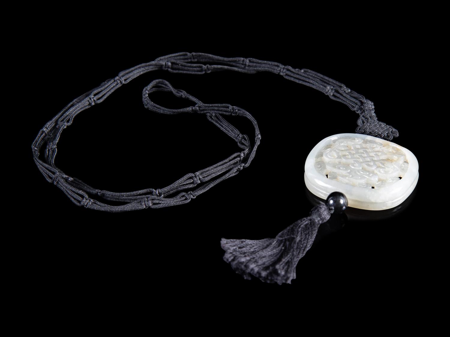 A Partial White Jade Reticulated Parfumier Pendant
