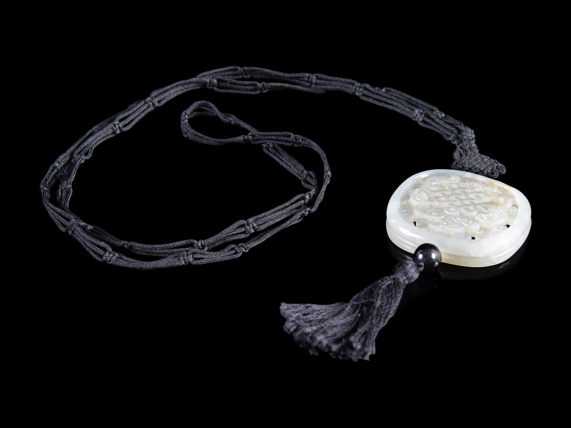 A Partial White Jade Reticulated Parfumier Pendant