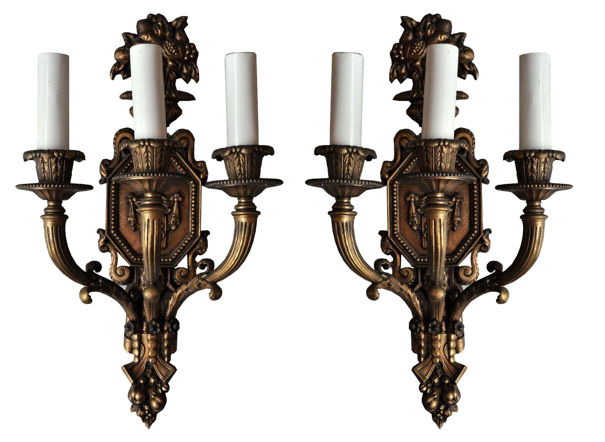 A Pair of Bronze Three-Arm Sconces 11" W x 7" D x 18" H — United States, Circa 1920