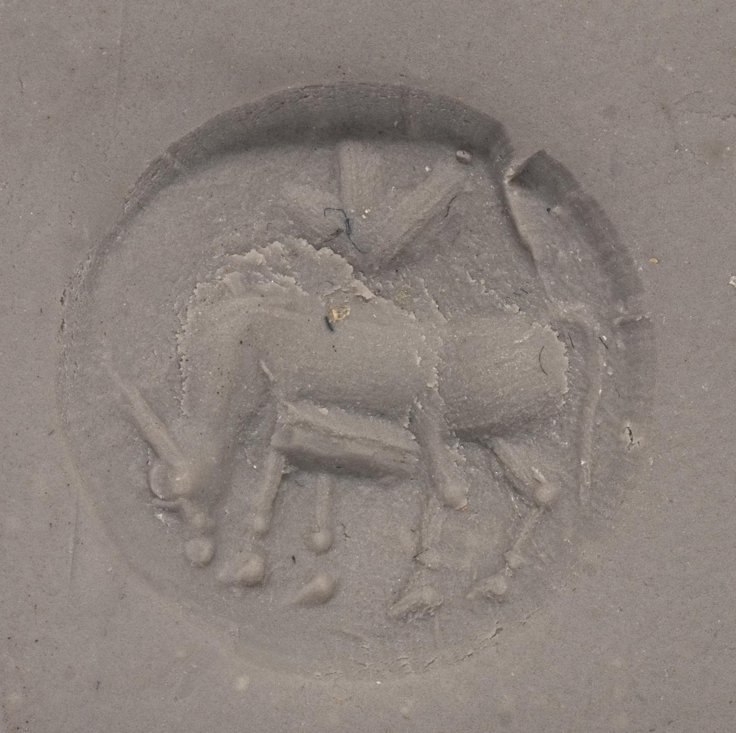 A Minoan Amethyst Lentoid with a Cow and Suckling Calf