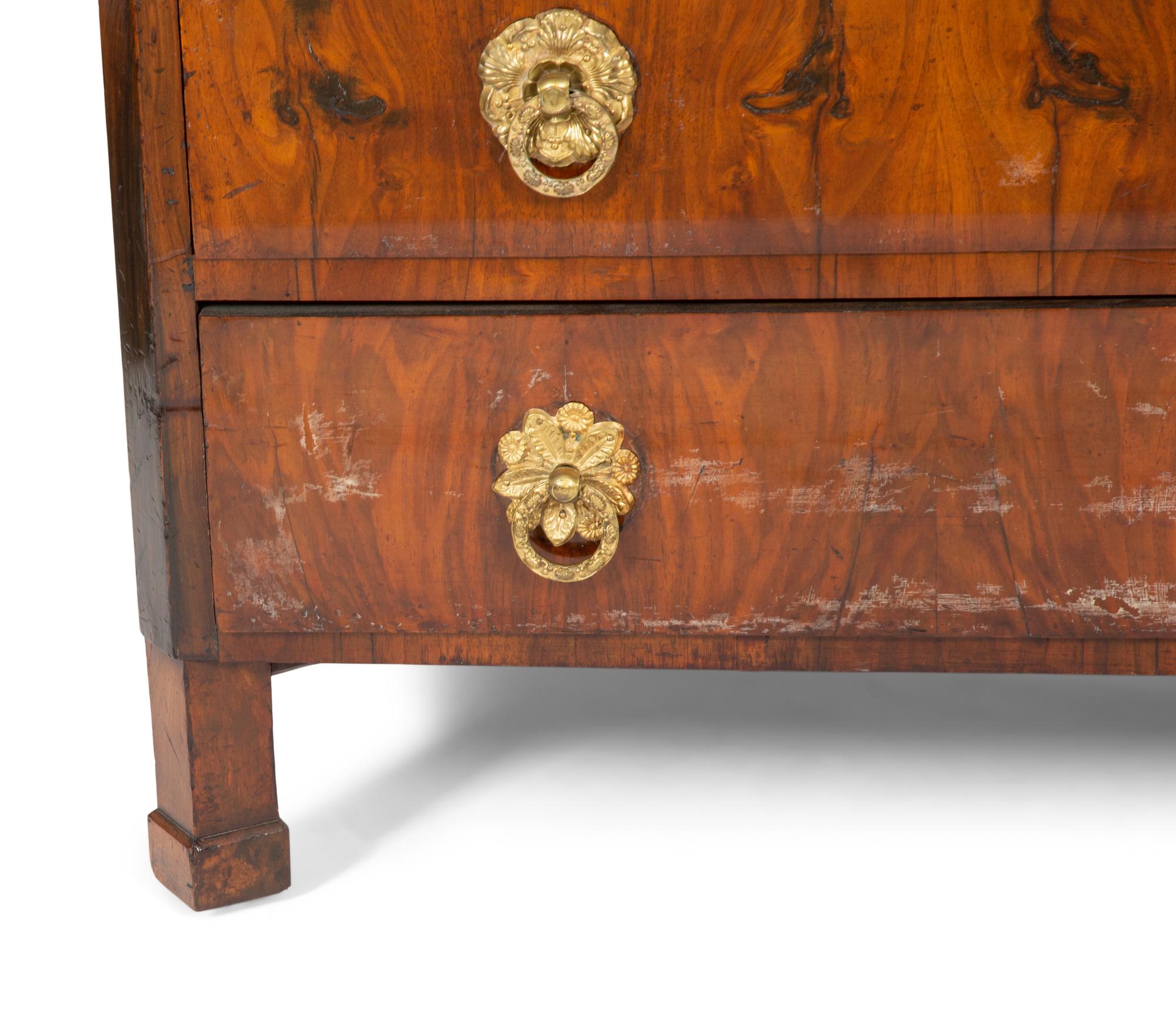 A Biedermeier Walnut Veneered and Grain-Painted Commode