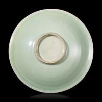 A Chinese Longquan Celadon Glazed Dish, 13th/14th Century 宋/元 龍泉窯梅子青釉碟