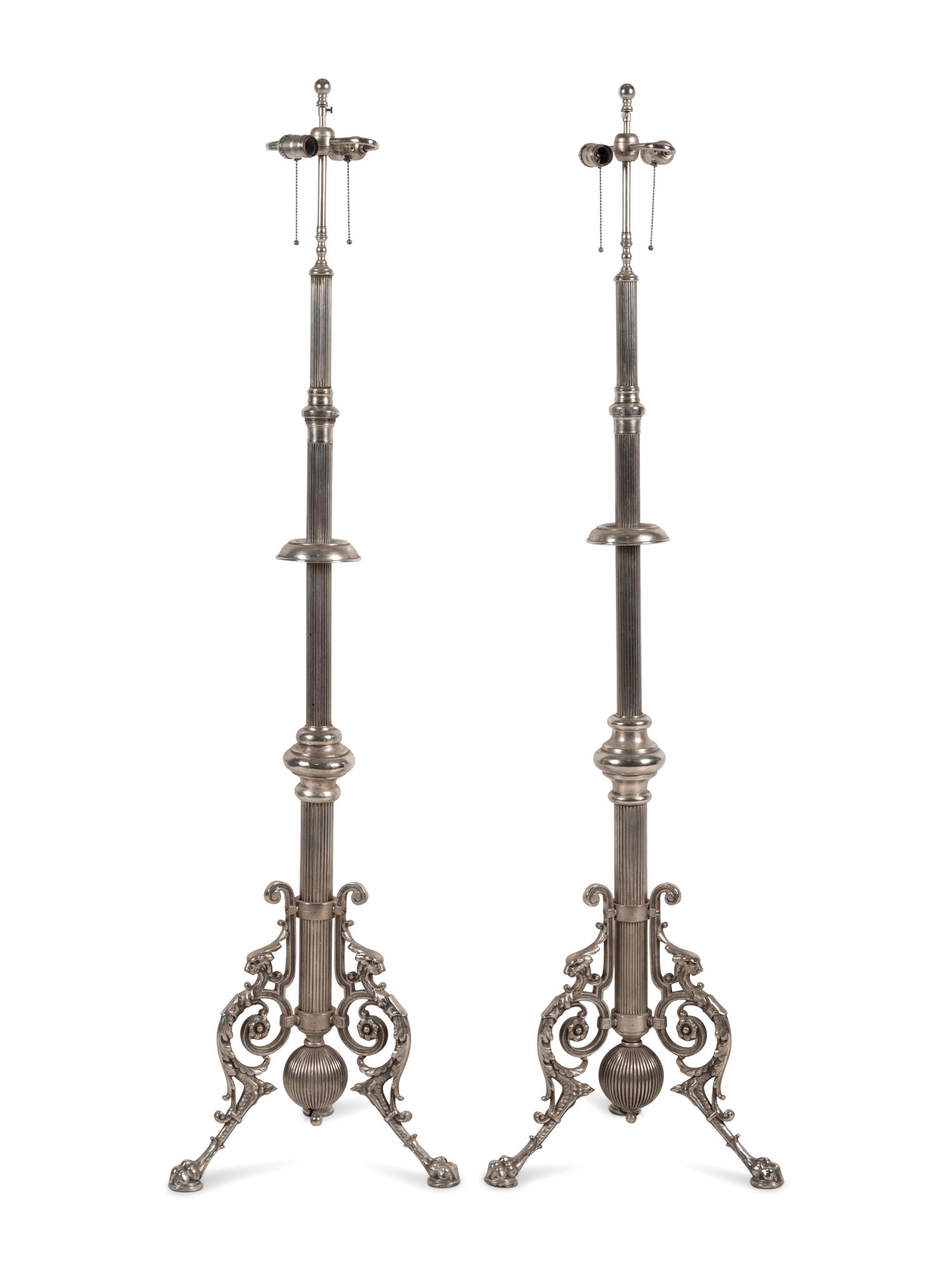 A Pair of French Neoclassical Silvered Bronze Telescoping Floor Lamps