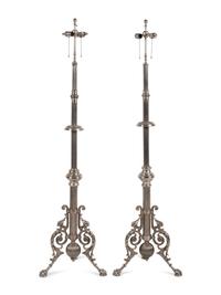 A Pair of French Neoclassical Silvered Bronze Telescoping Floor Lamps
