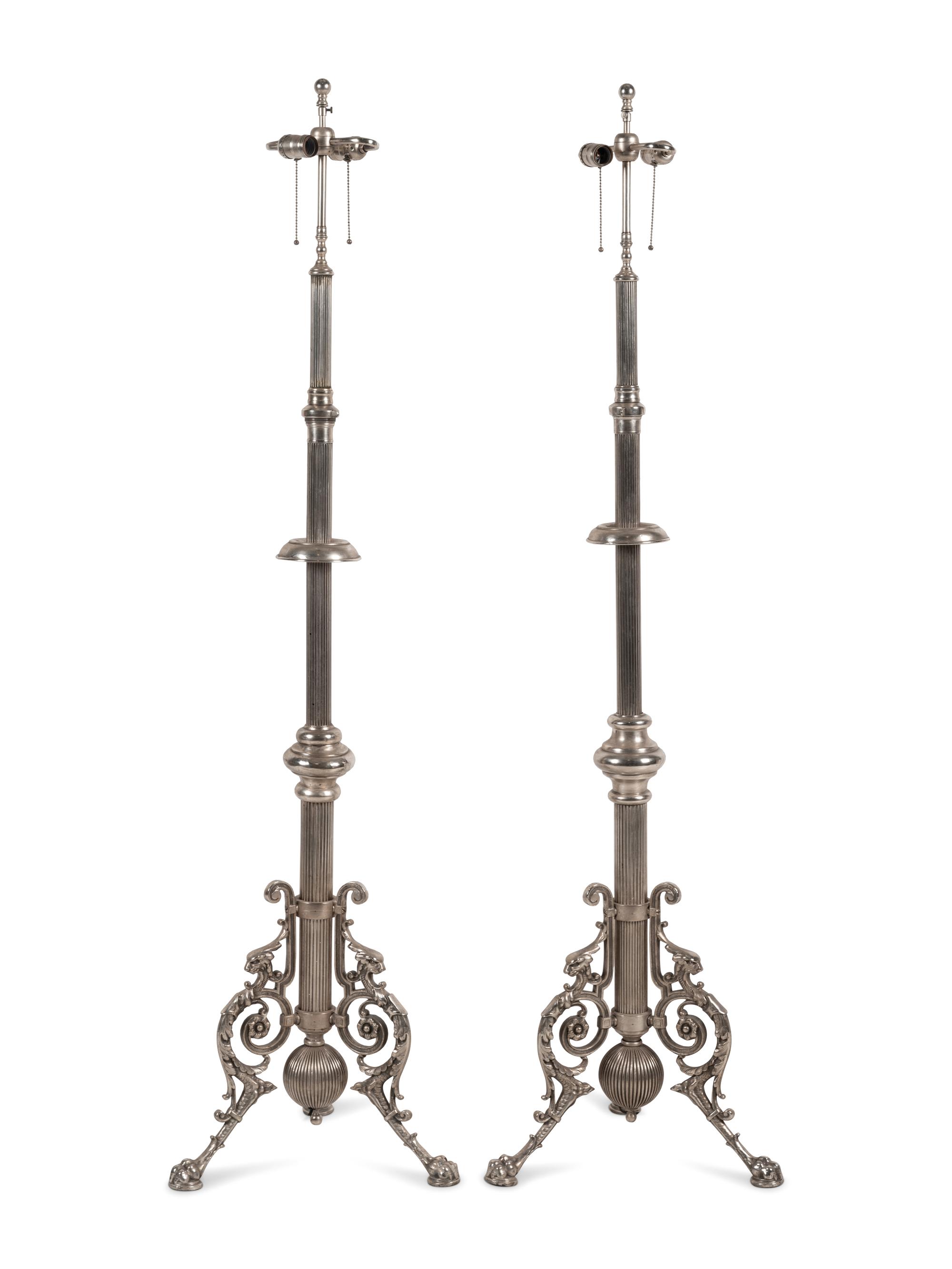 A Pair of French Neoclassical Silvered Bronze Telescoping Floor Lamps