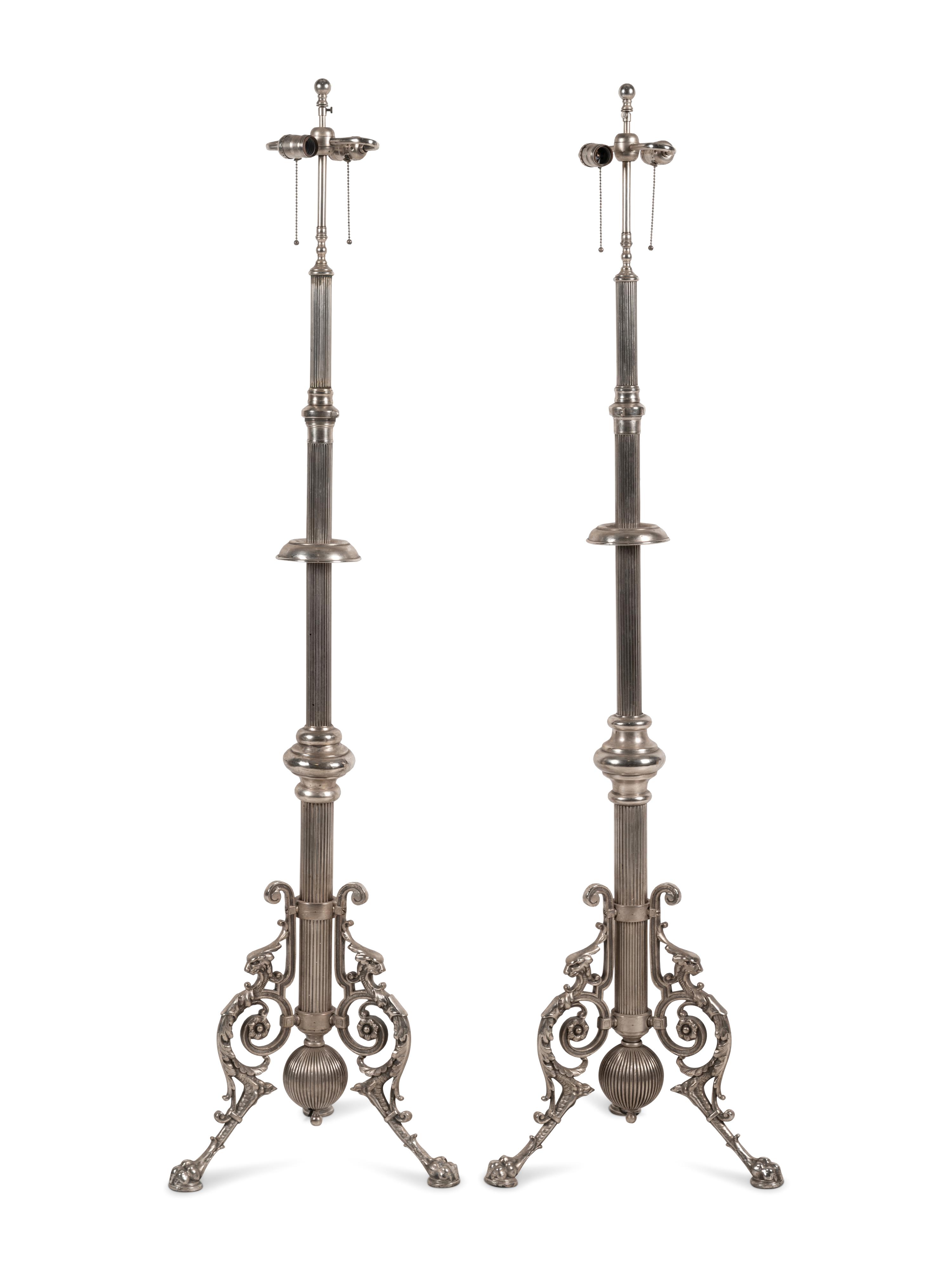 A Pair of French Neoclassical Silvered Bronze Telescoping Floor Lamps