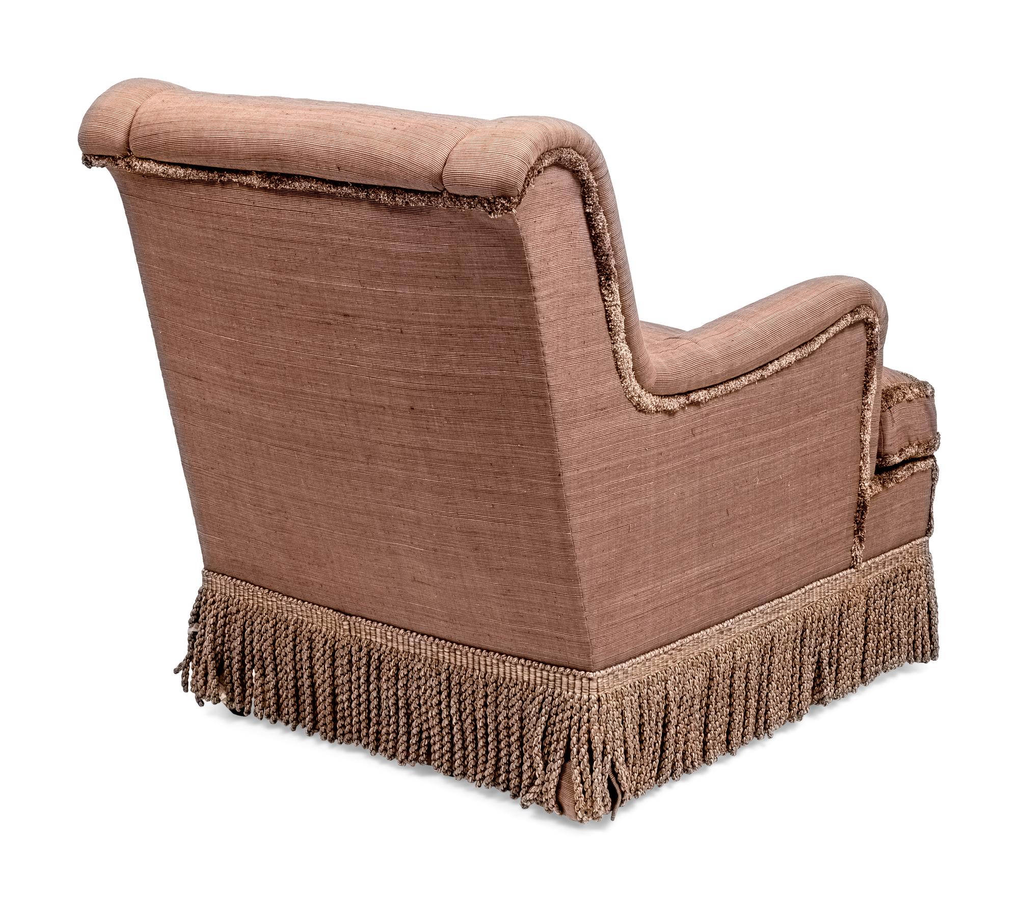 An English Upholstered Easy Chair