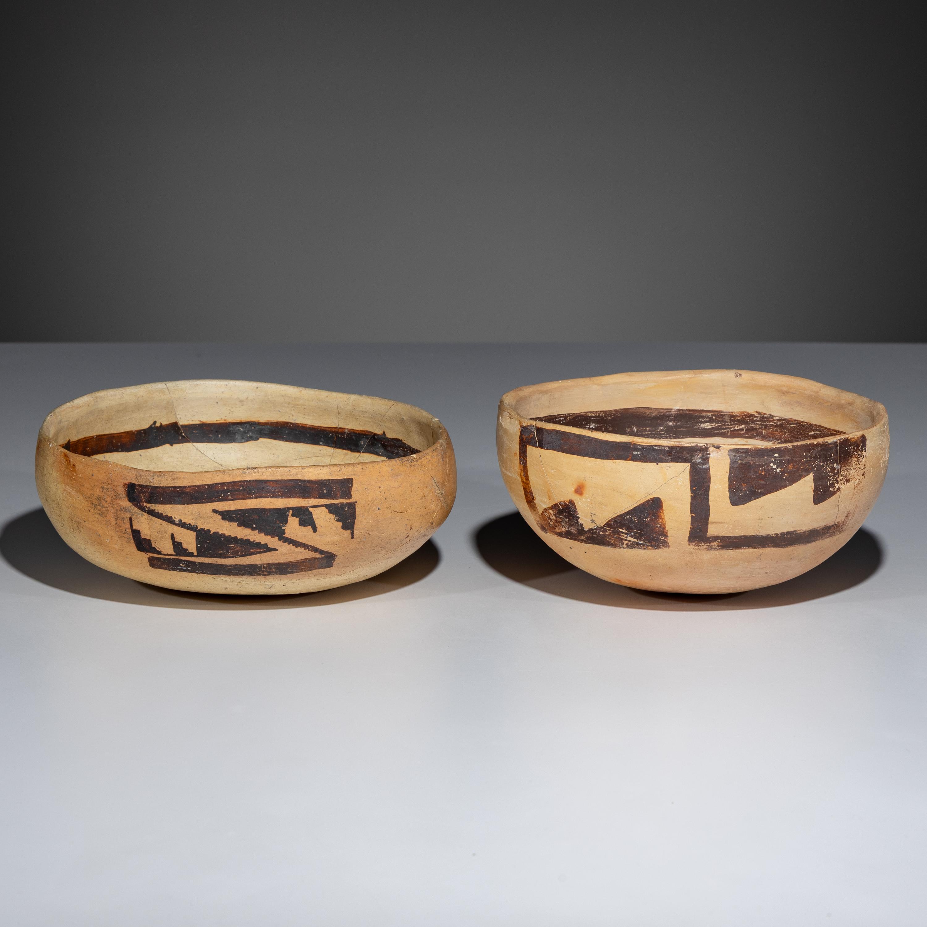 Ancestral Pueblo, Jeddito Black-on-Yellow Pottery Bowls, with Geometric Designs