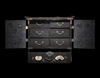 A Japanese Porcelain and Metal Inset Wood Chest