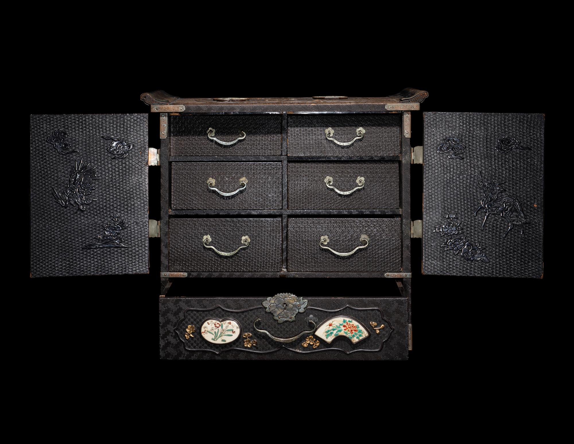 A Japanese Porcelain and Metal Inset Wood Chest
