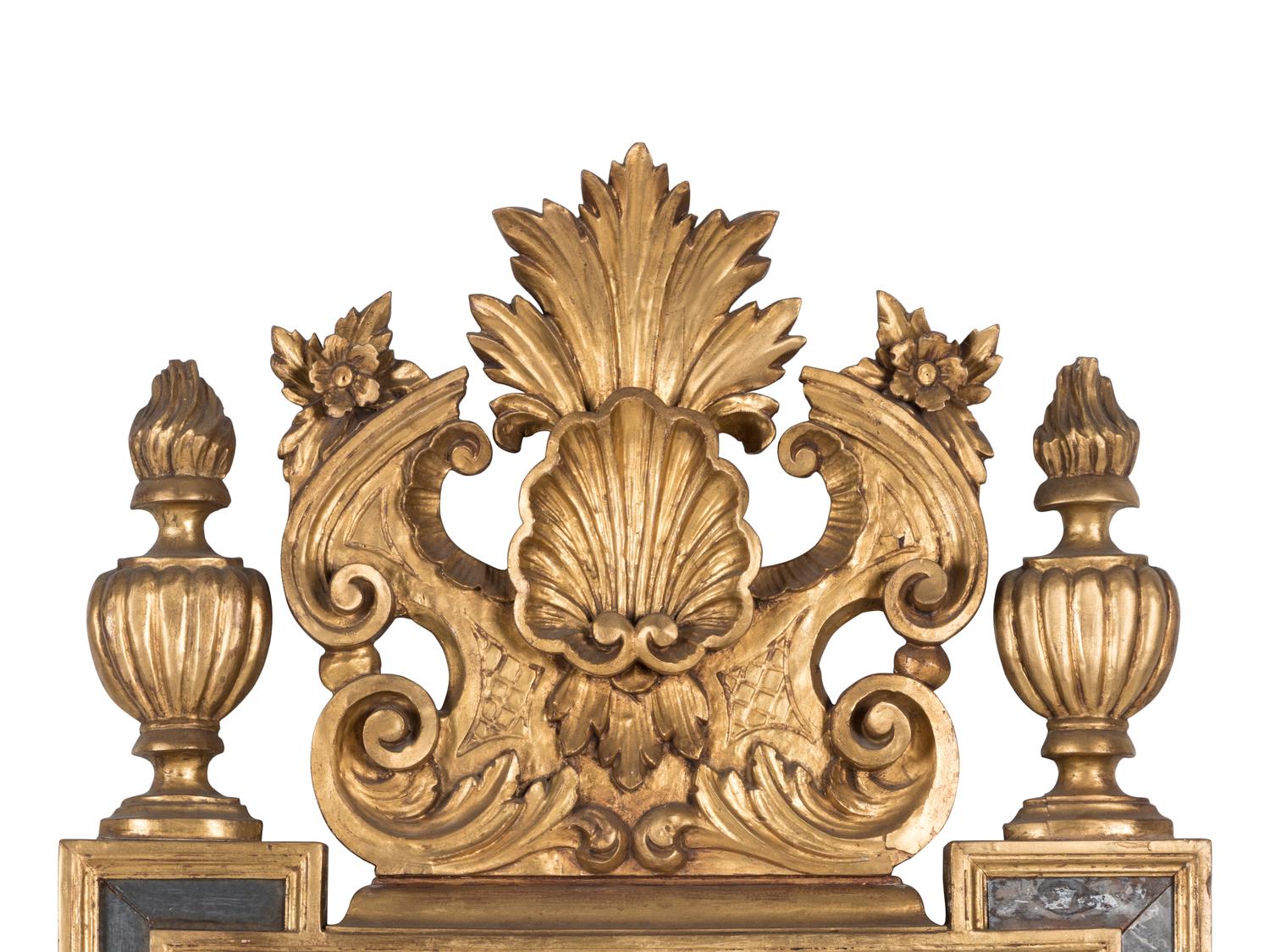 An Italian Baroque Style Giltwood Mirror