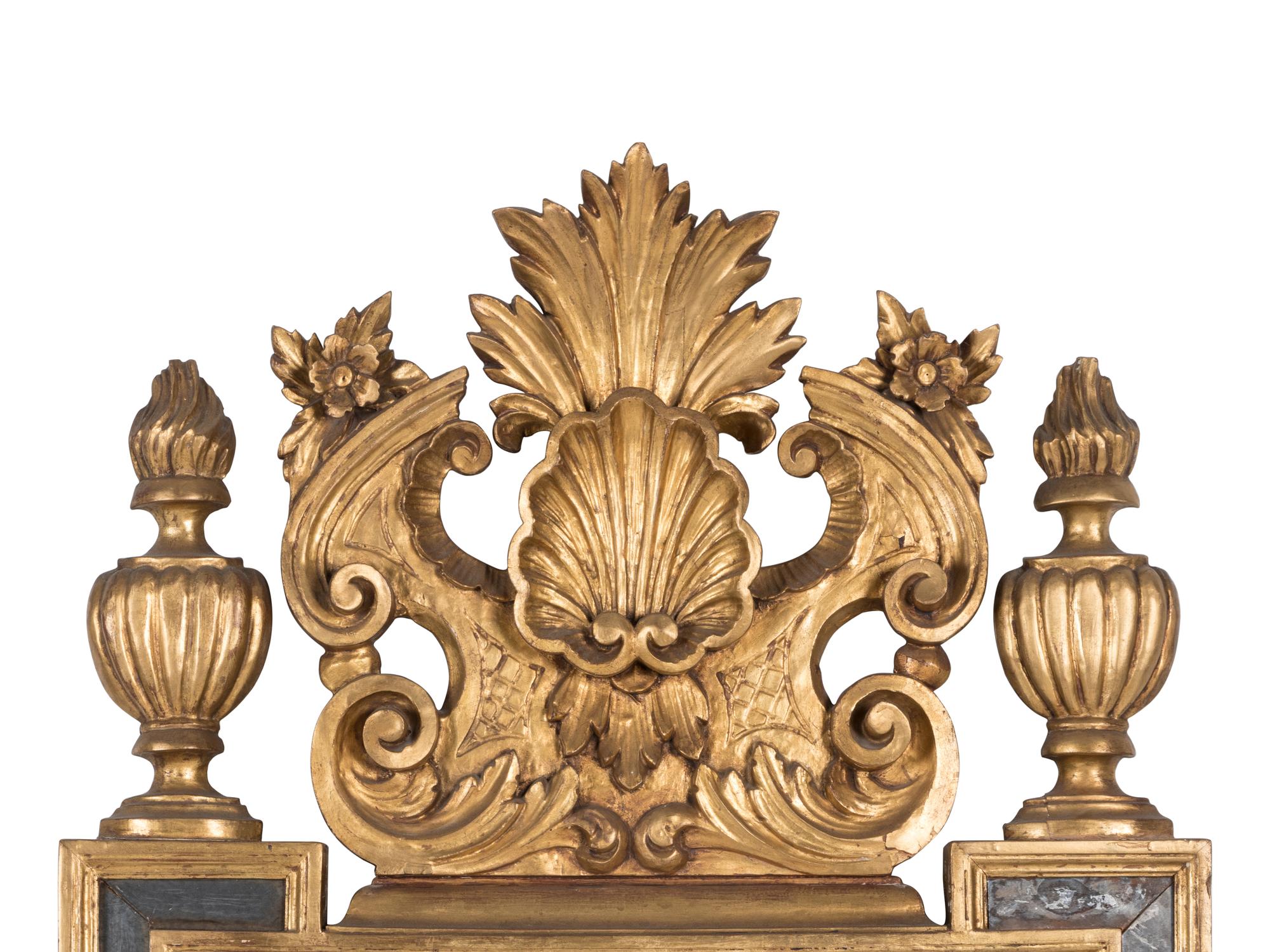 An Italian Baroque Style Giltwood Mirror