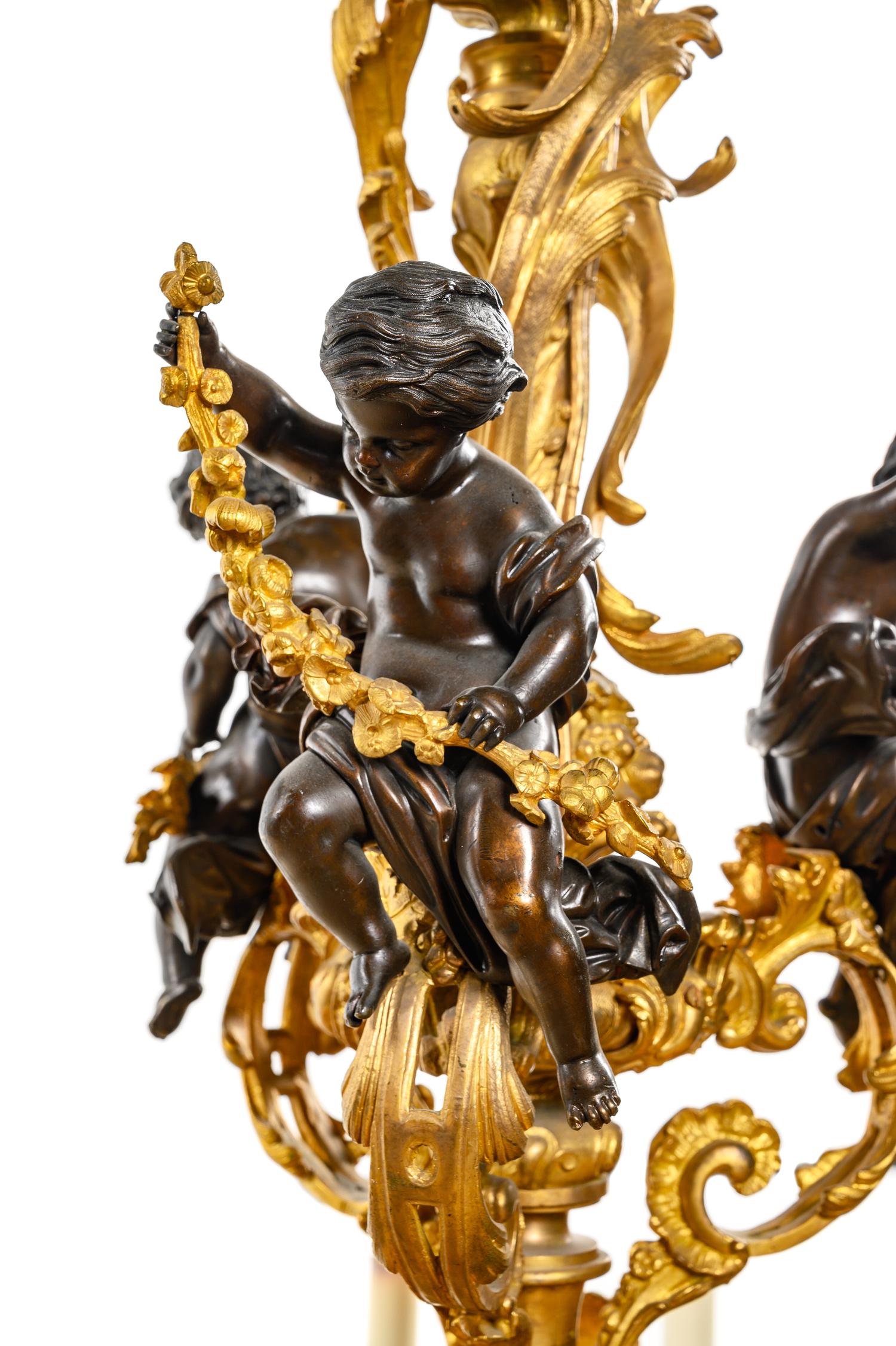 A Massive Louis XV Style Gilt Bronze Figural Sixty-Light Chandelier
