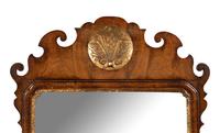 A George III Parcel-Gilt Mahogany Mirror