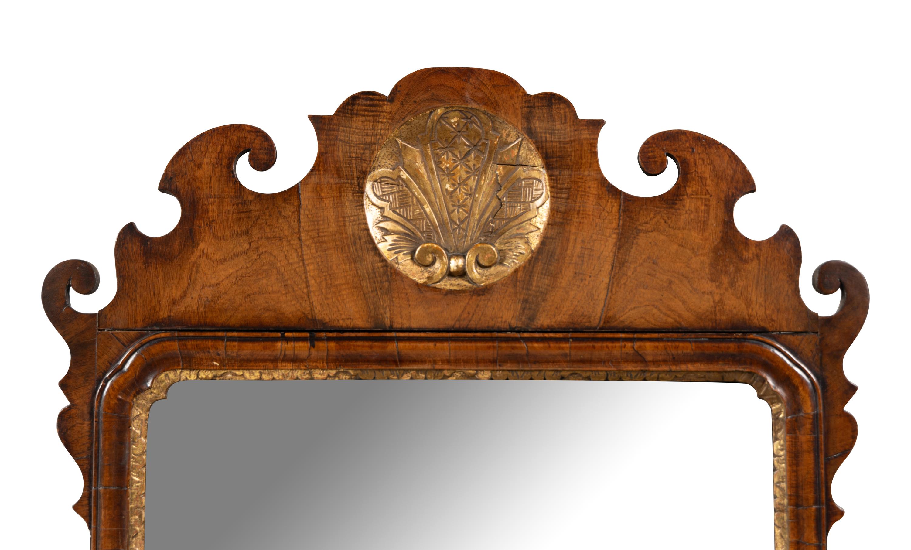 A George III Parcel-Gilt Mahogany Mirror