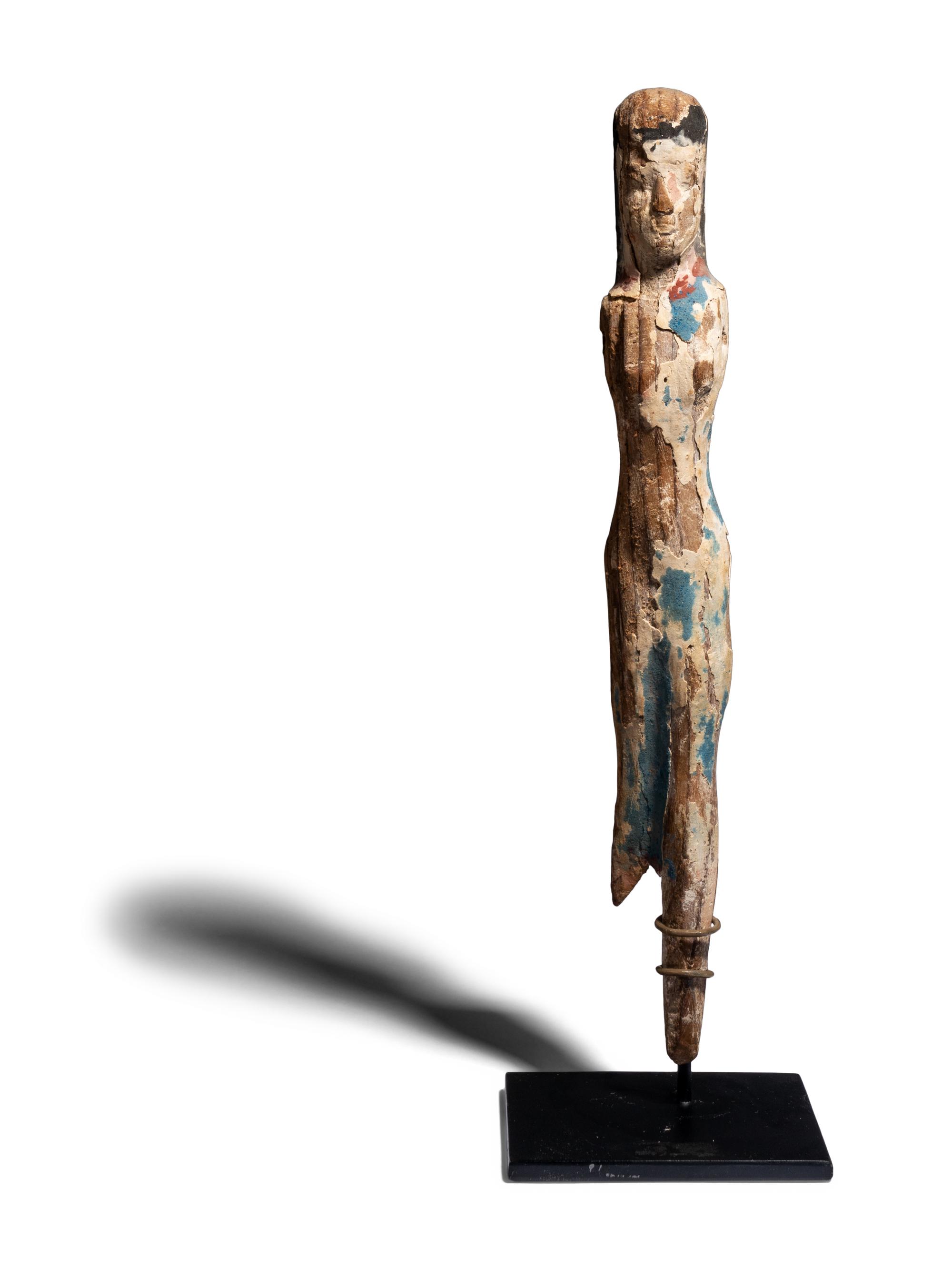 An Egyptian Painted Wood Female Figure