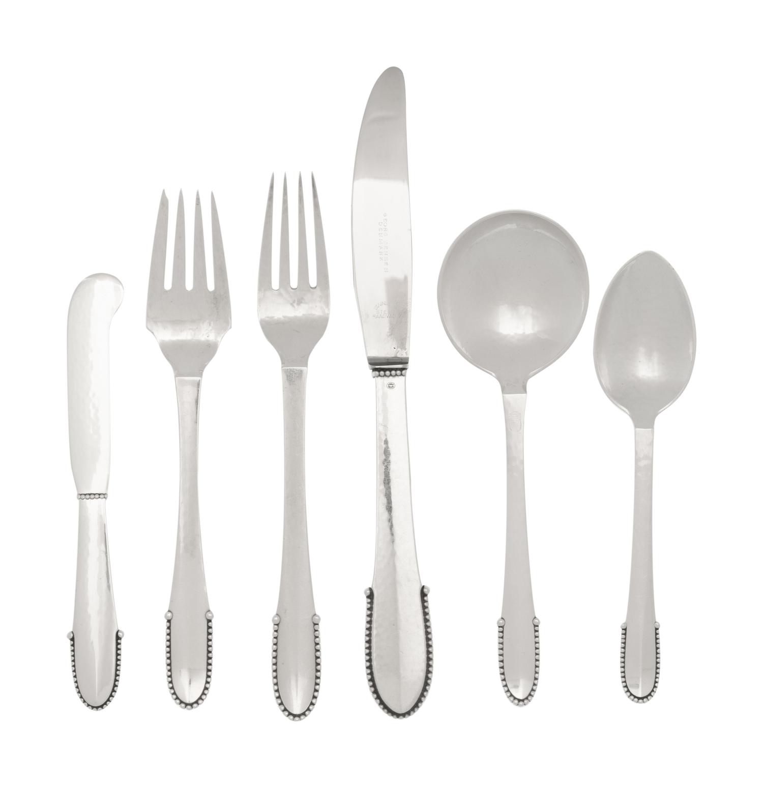 A Georg Jensen Beaded Silver Flatware Service