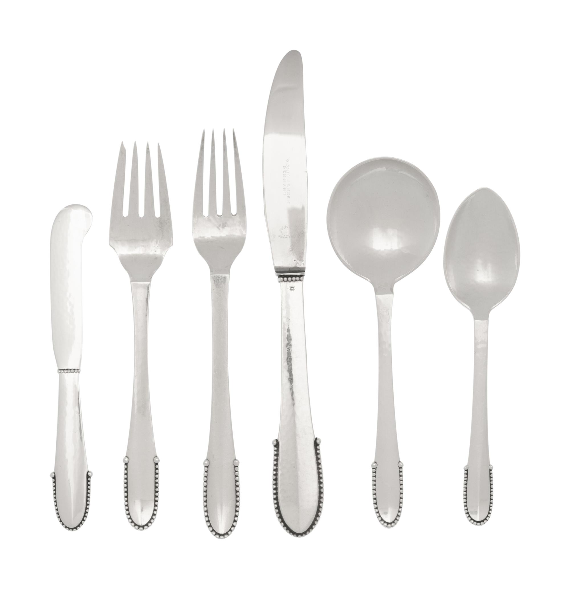 A Georg Jensen Beaded Silver Flatware Service