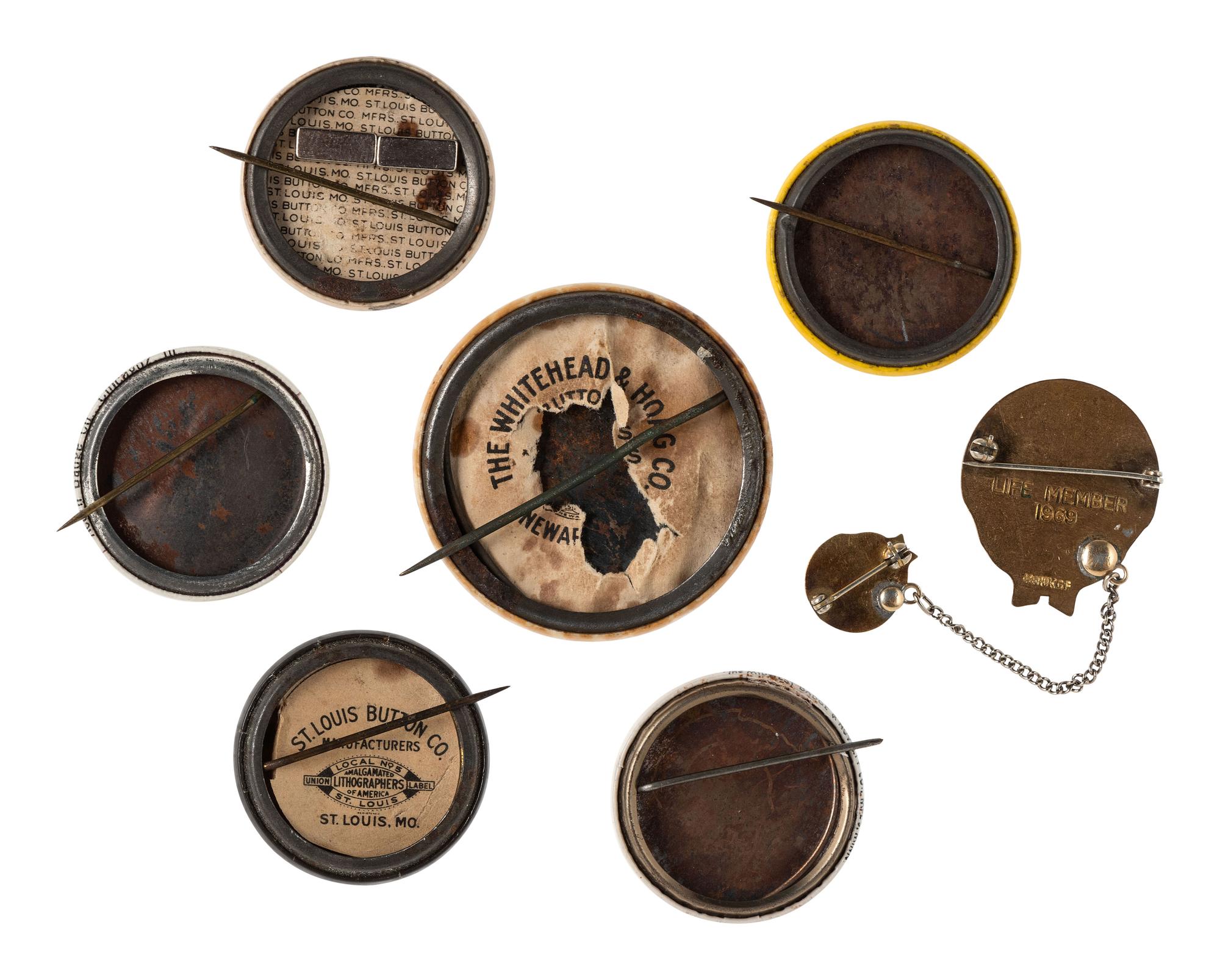 [CIVIL RIGHTS]. A group of 7 pinbacks related to Booker T. Washington, the National Negro Business League, and others.