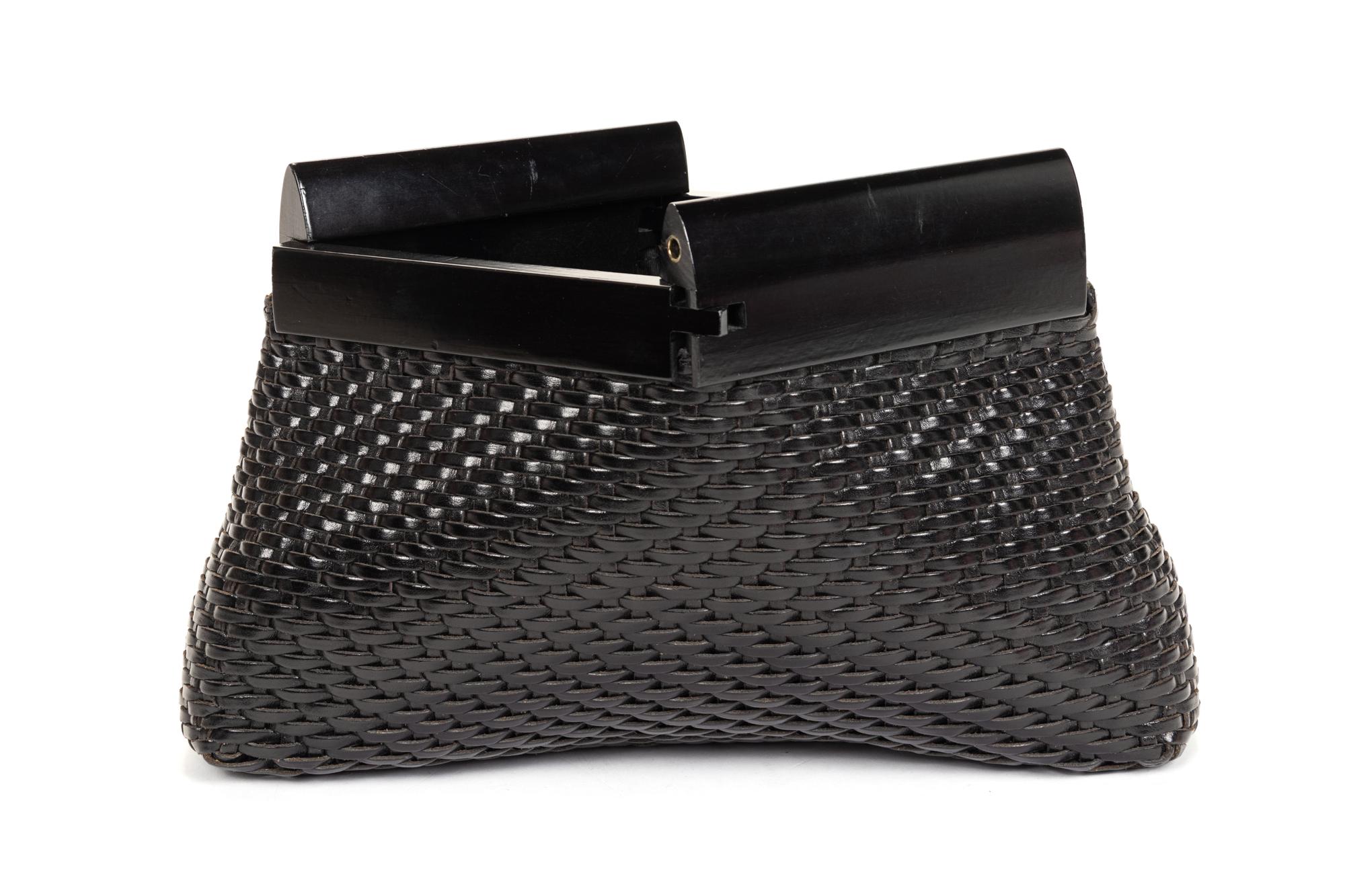 Four Woven Leather Handbags: Two Bottega Veneta, One Fendi, and One De Vecchi, 1980s