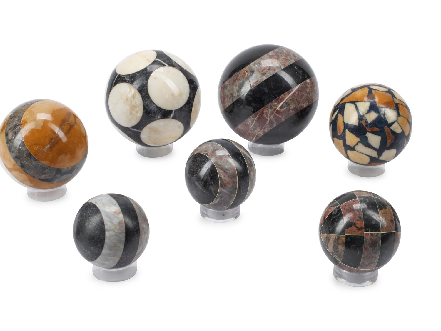 A Collection of Marble Spherical Ornaments