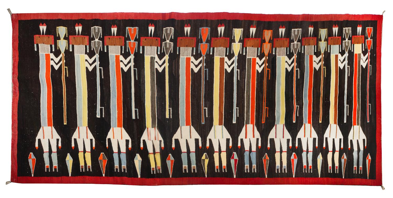 A Navajo Yei Rug, Greasewood Springs 140 x 68 inches. — CIRCA 1930
