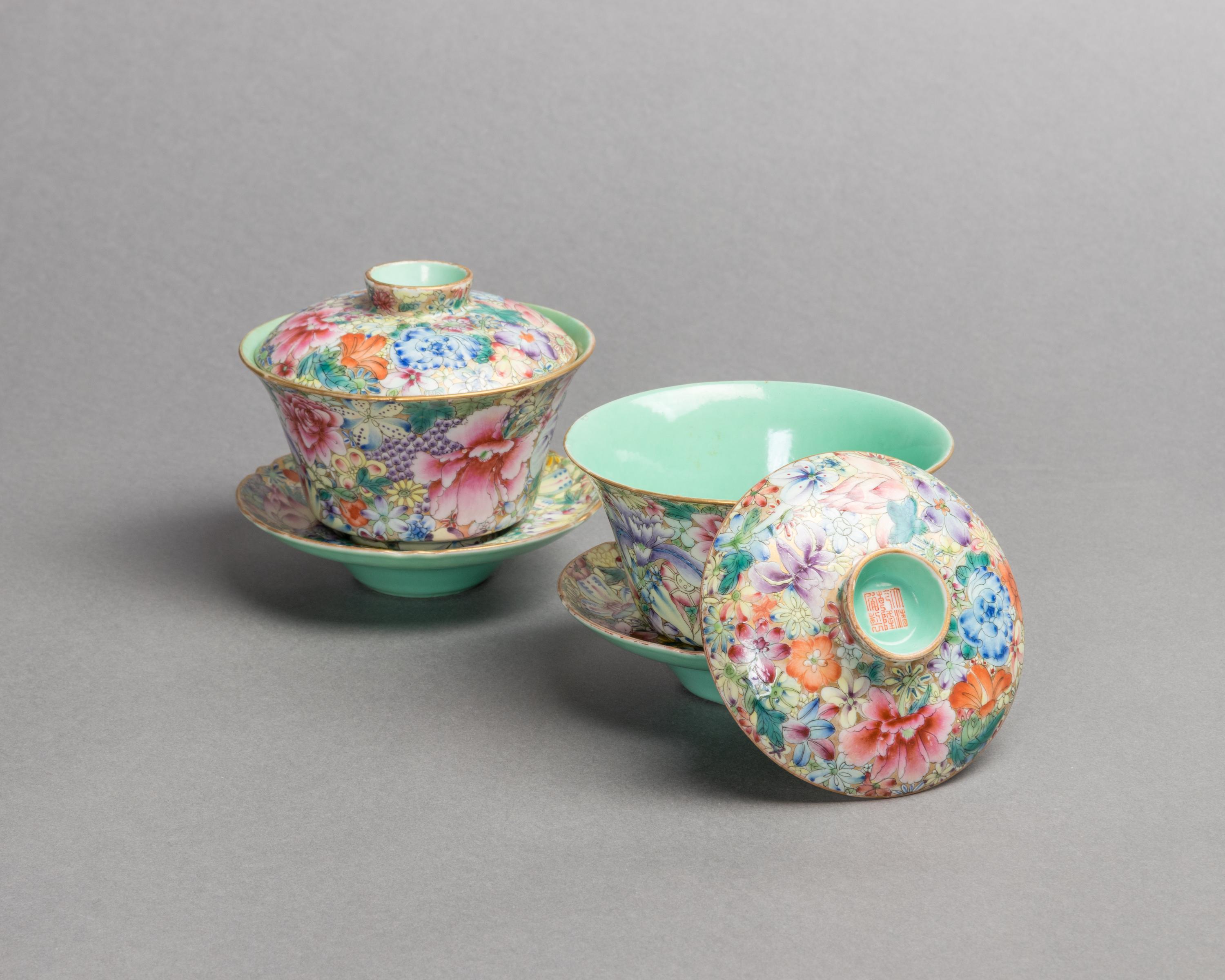 A Pair of Famille Rose Porcelain 'Millefleur' Tea Cups and Saucers Diameter of tea cup 4 1/8 inches. — 19TH CENTURY
