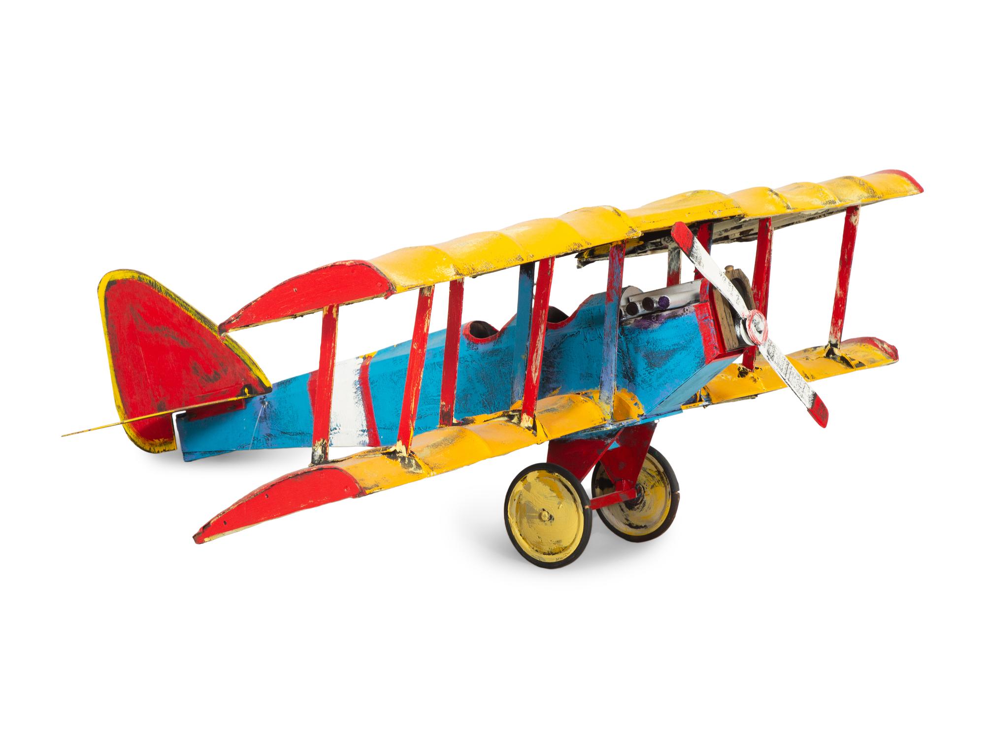 A Large Painted Canvas and Wood Model of a Biplane