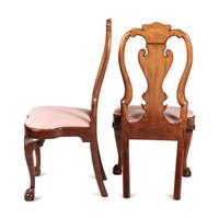 A Set of Four Queen Anne Style Shell and Volute Carved Cherrywood Compass-Seat Claw-and-Ball Foot Side Chairs