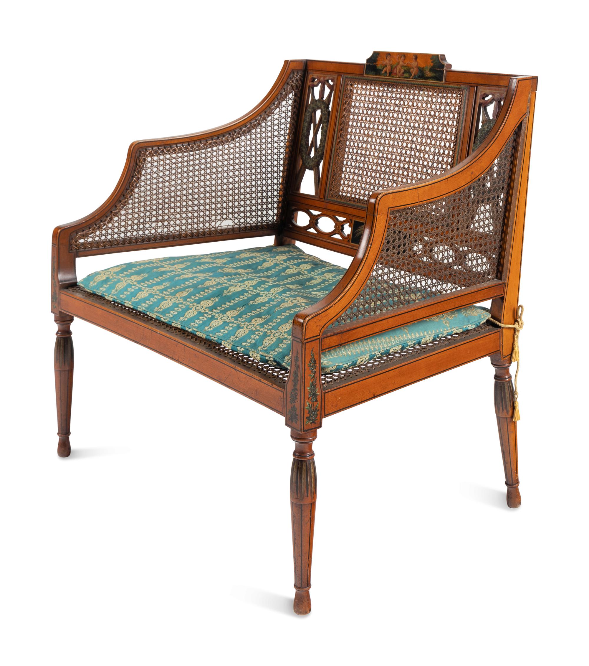 An Edwardian Painted and Caned Armchair