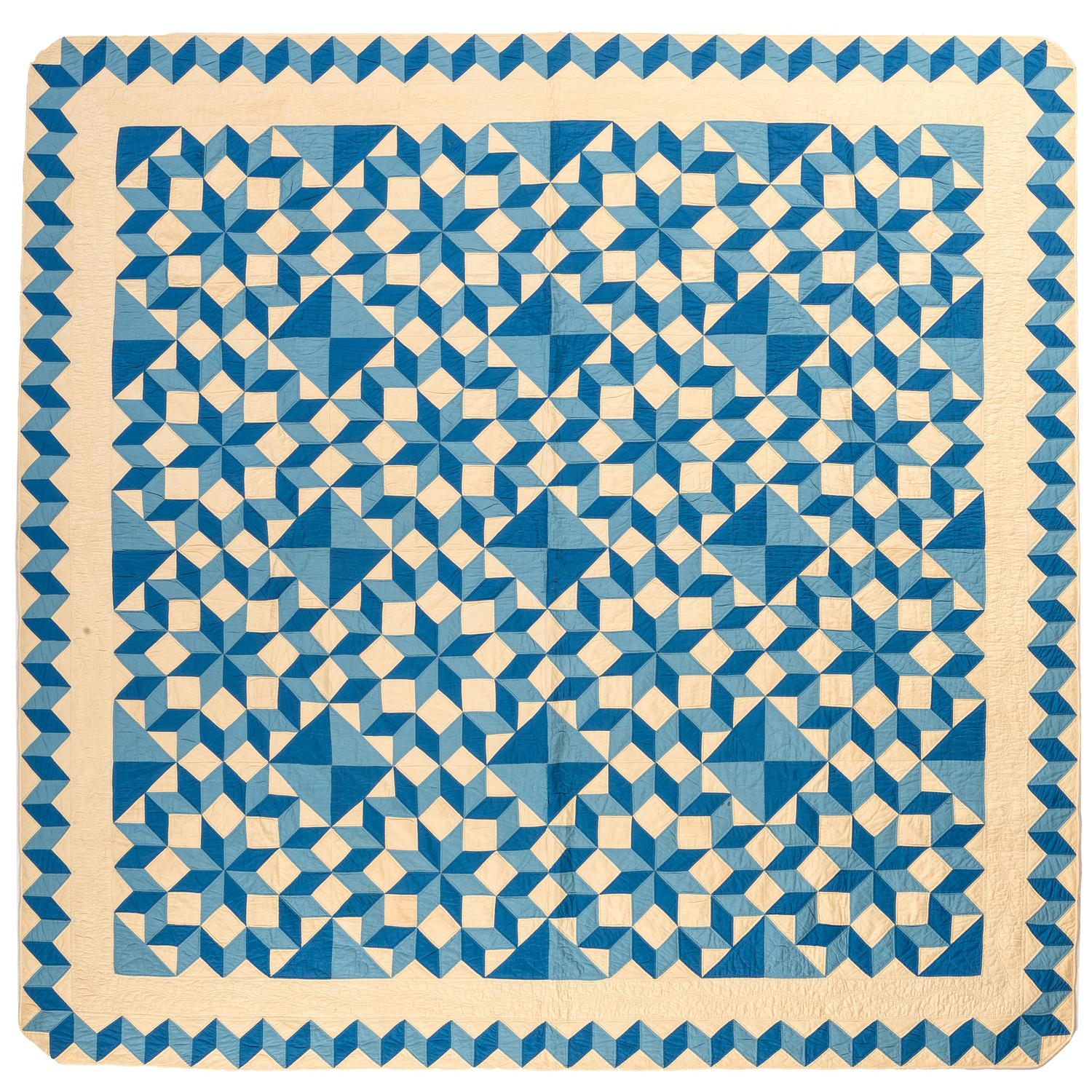 A Blue and White Tumbling Blocks Quilt