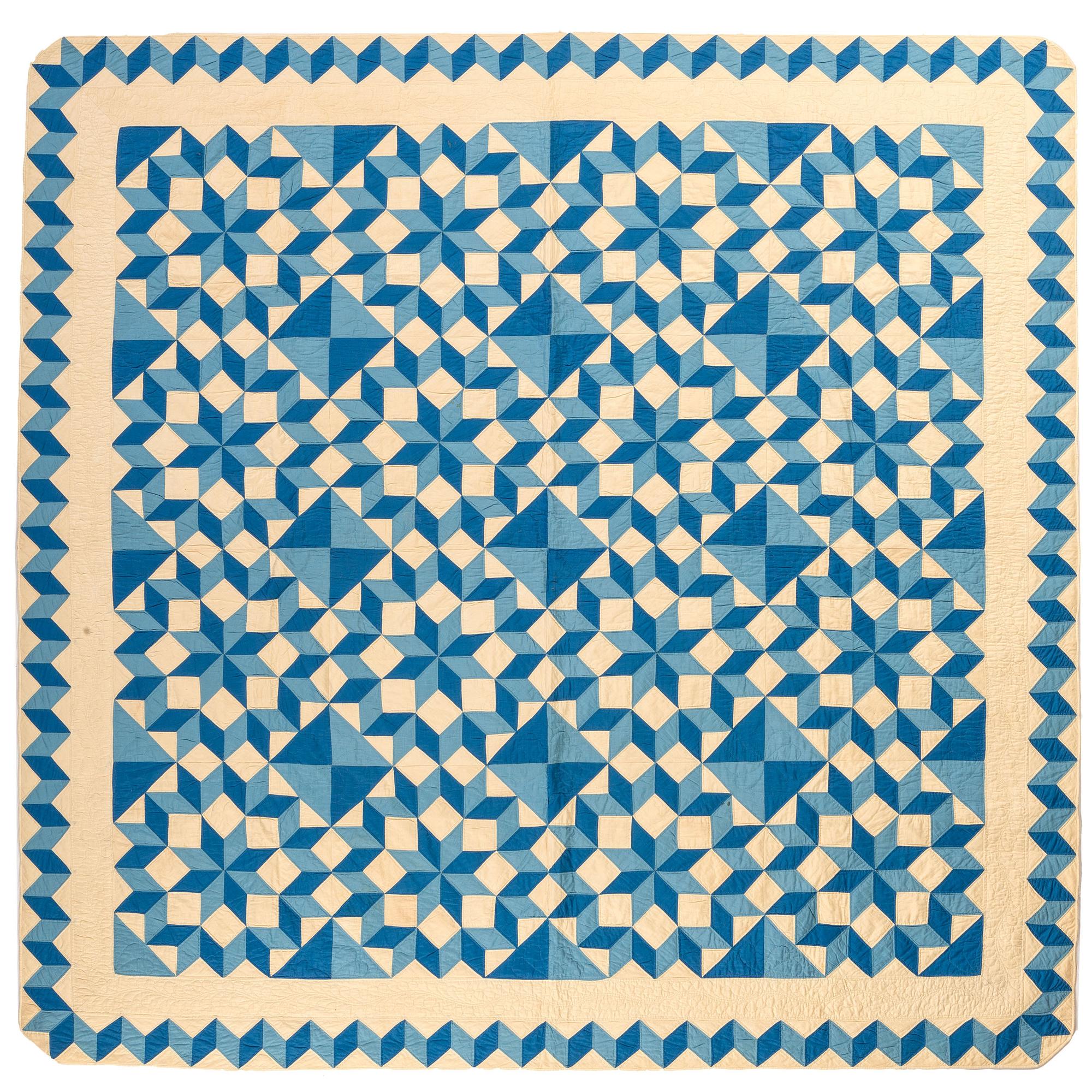 A Blue and White Tumbling Blocks Quilt