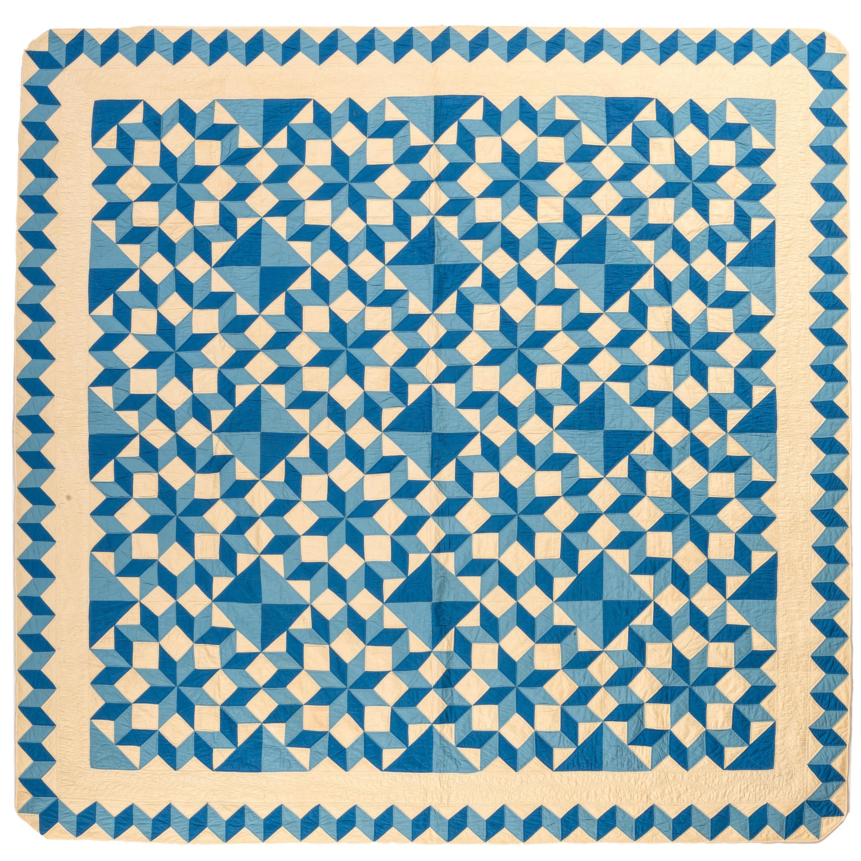 A Blue and White Tumbling Blocks Quilt